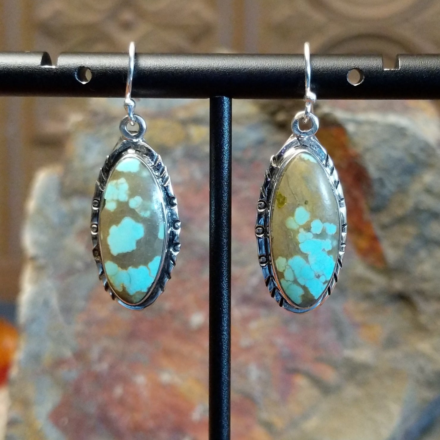 #8 Turquoise ellipse French hook earrings by Navajo artist John King.