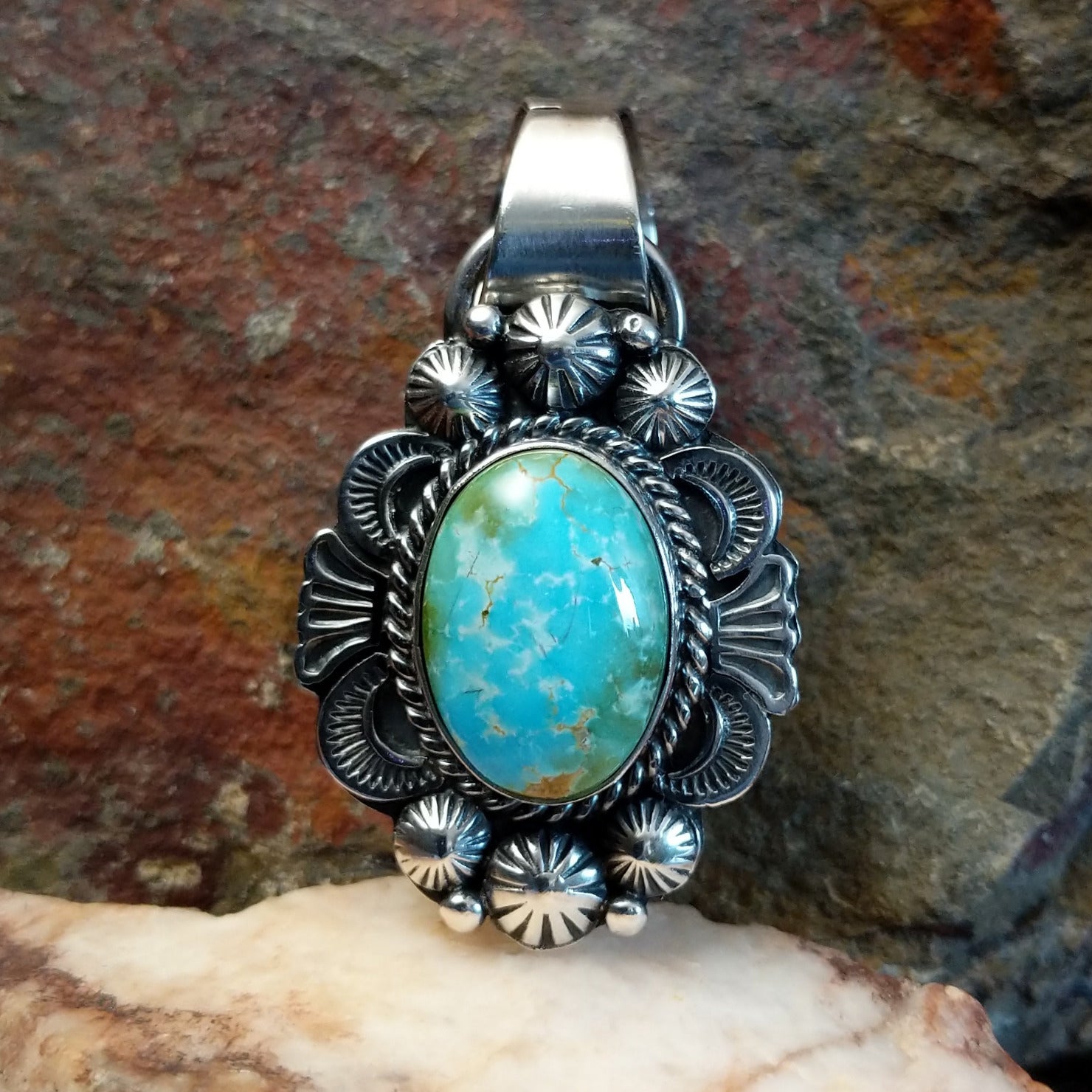Sonoran Gold turquoise pendant by Navajo artist Rosita Calladitto, handcrafted in sterling silver.