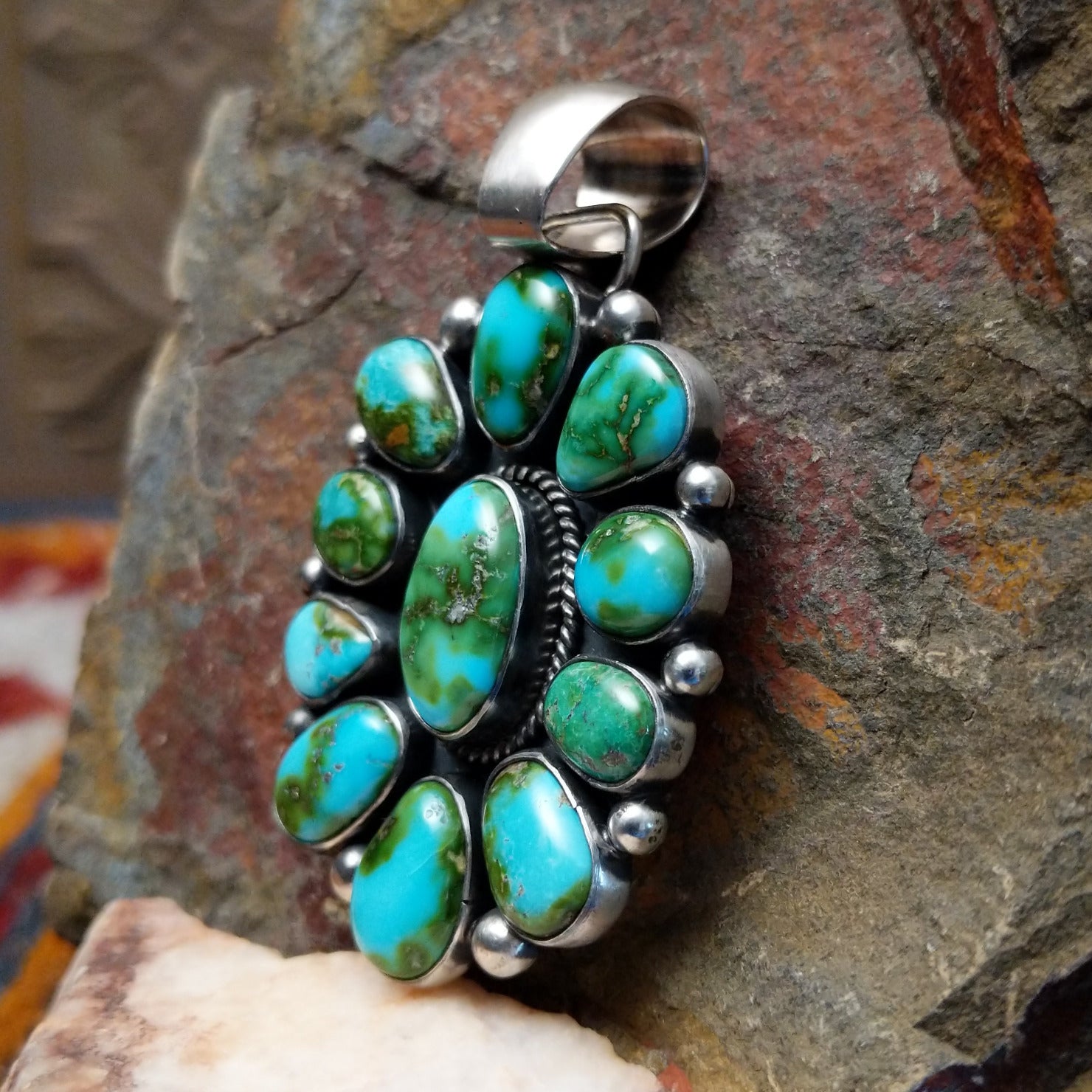 multi-stone Sonoran Gold turquoise pendant by Navajo artist Angela Martin, handcrafted in sterling silver - side view.