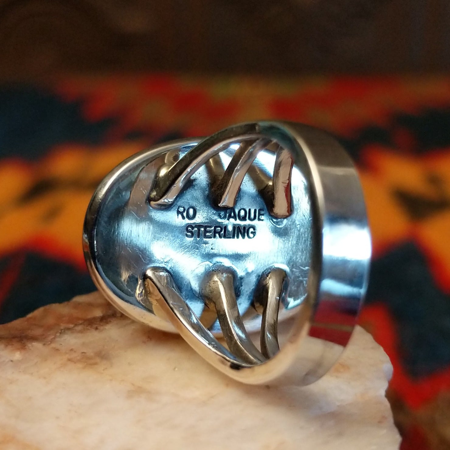 Artisan and Sterling stamp on underside of ring.
