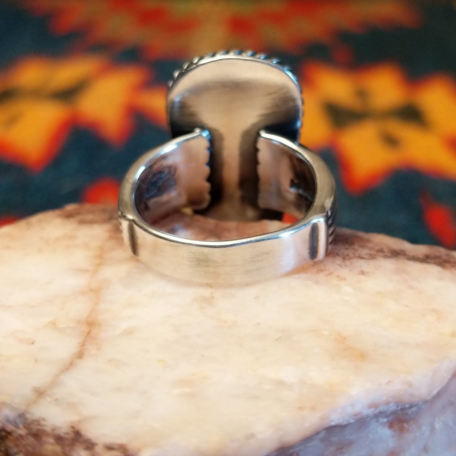 Sonoran Gold Turquoise ovate shaped stone set in sterling silver. Created by Murphy Platero, size 6.5 underside of ring view.