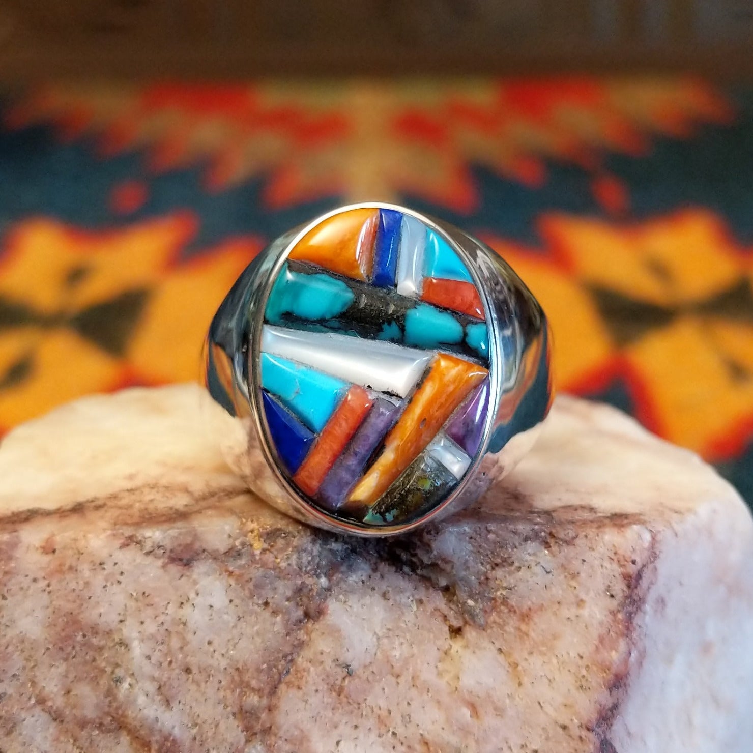 Size 12.5 Navajo multistone, cobblestone style ring by J.Y. features a vibrant mosaic of hand-cut stones set in sterling silver. Front view
