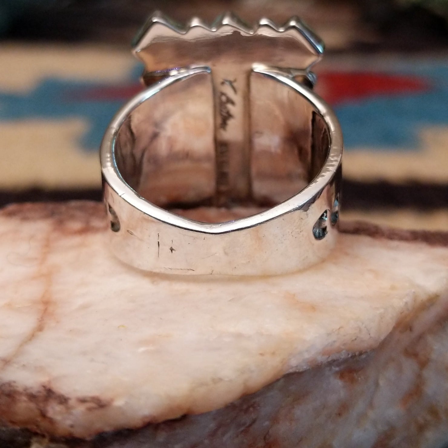 Sterling silver turquoise cluster ring by Verley Betone featuring multiple blue turquoise stones in a traditional Navajo floral-inspired design. Underside view.