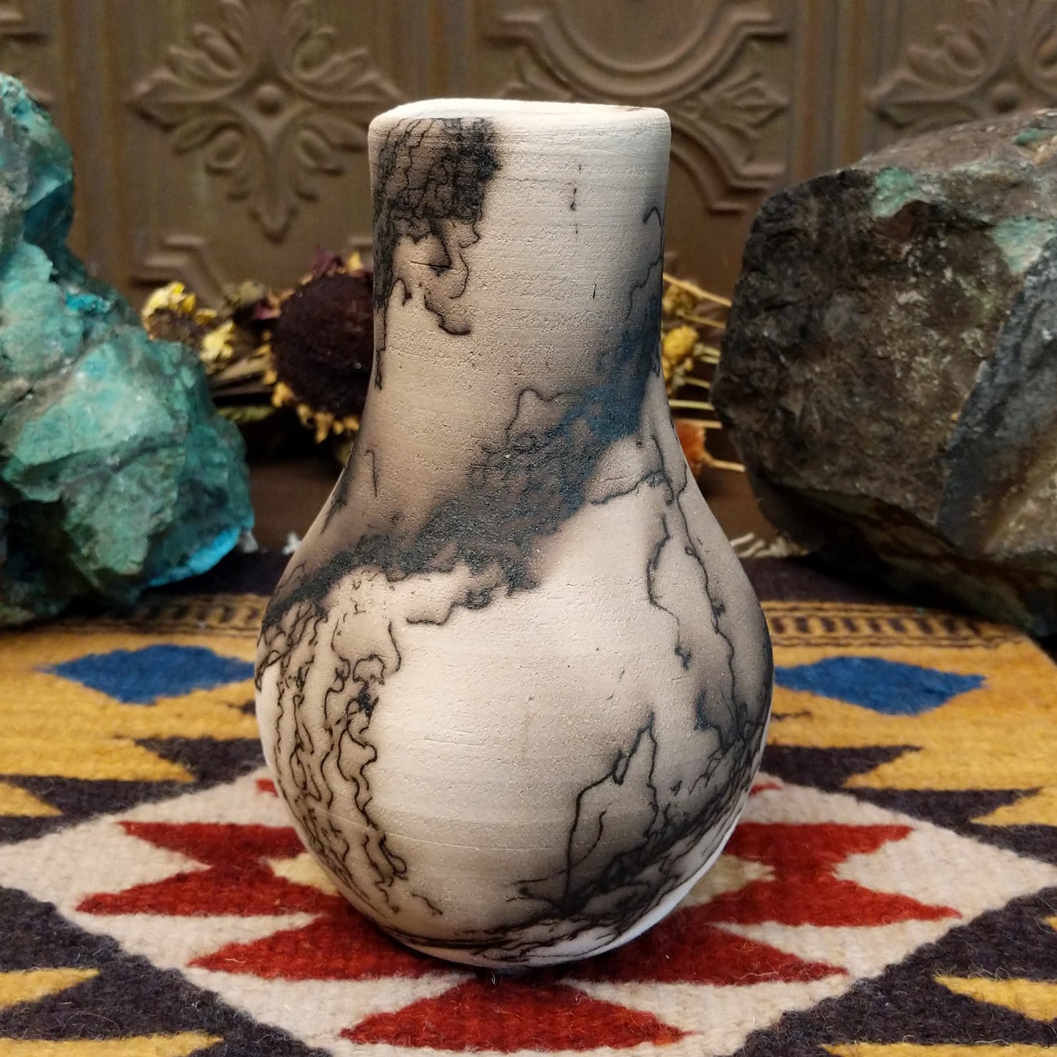 Medium-sized white horsehair chiminea-style vase by local artist Jim Calhoun with smoky natural markings, polished finish, and handcrafted Southwestern design.
