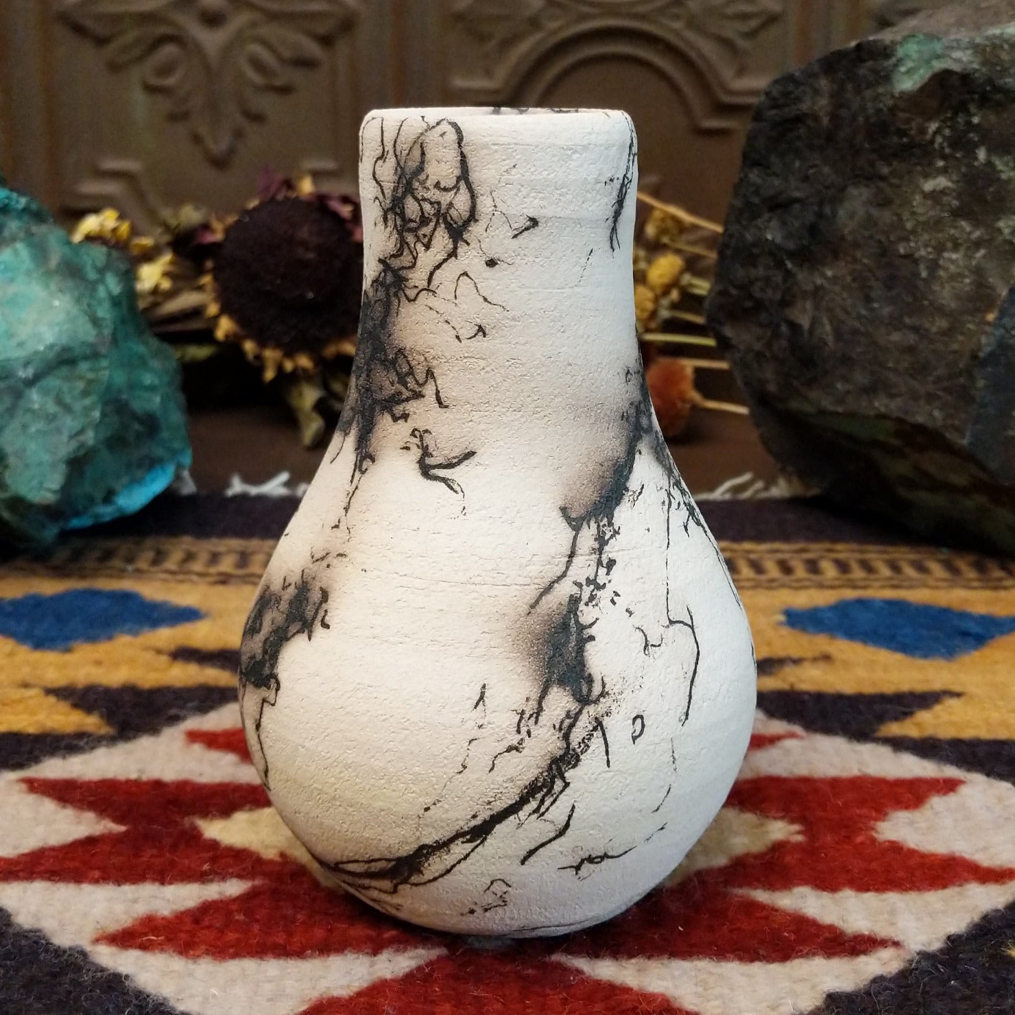 Small chiminea-style white horsehair pottery vase by local artisan Jim Calhoun with smoky natural patterns, polished finish, and handcrafted Southwestern design.