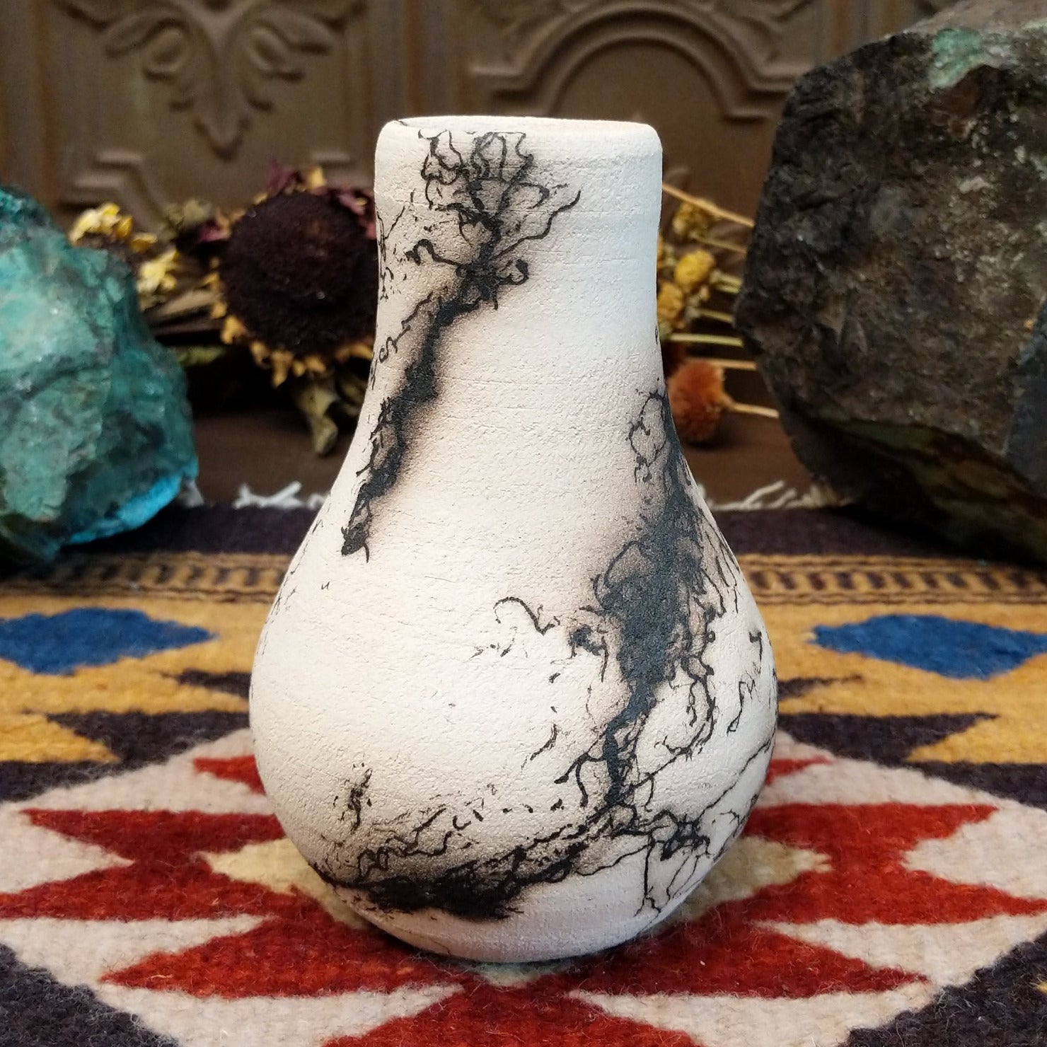 Small chiminea-style white horsehair pottery vase by local artisan Jim Calhoun with smoky natural patterns, polished finish, and handcrafted Southwestern design.