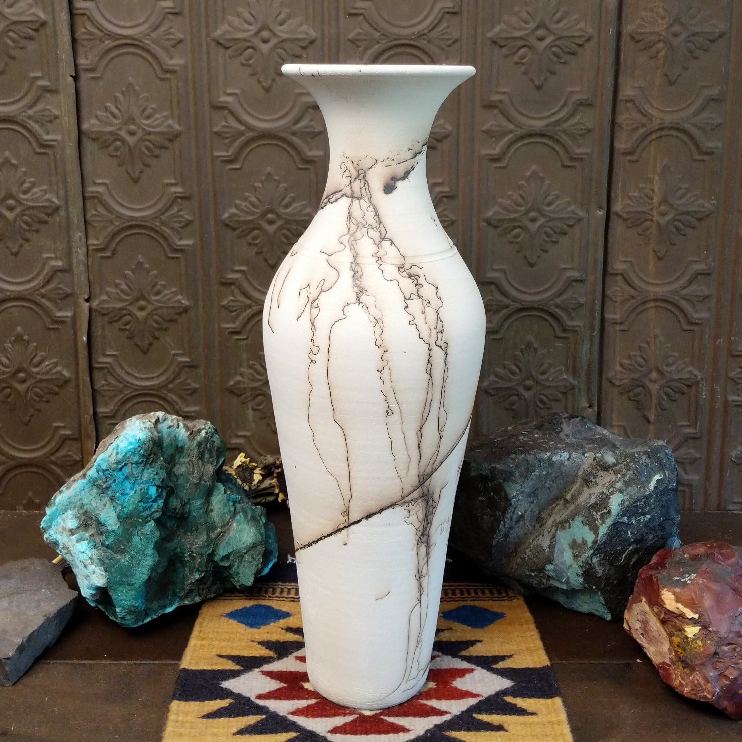 Tall flared white horsehair pottery vase by local artisan Jim Calhoun featuring smoky black organic patterns, polished white finish, and handcrafted Southwestern design.