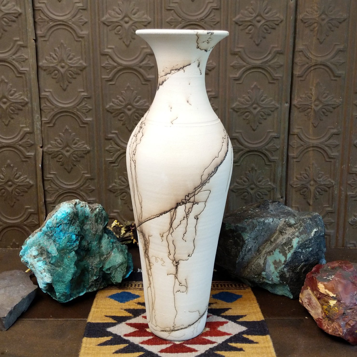 Tall flared white horsehair pottery vase by local artisan Jim Calhoun featuring smoky black organic patterns, polished white finish, and handcrafted Southwestern design.