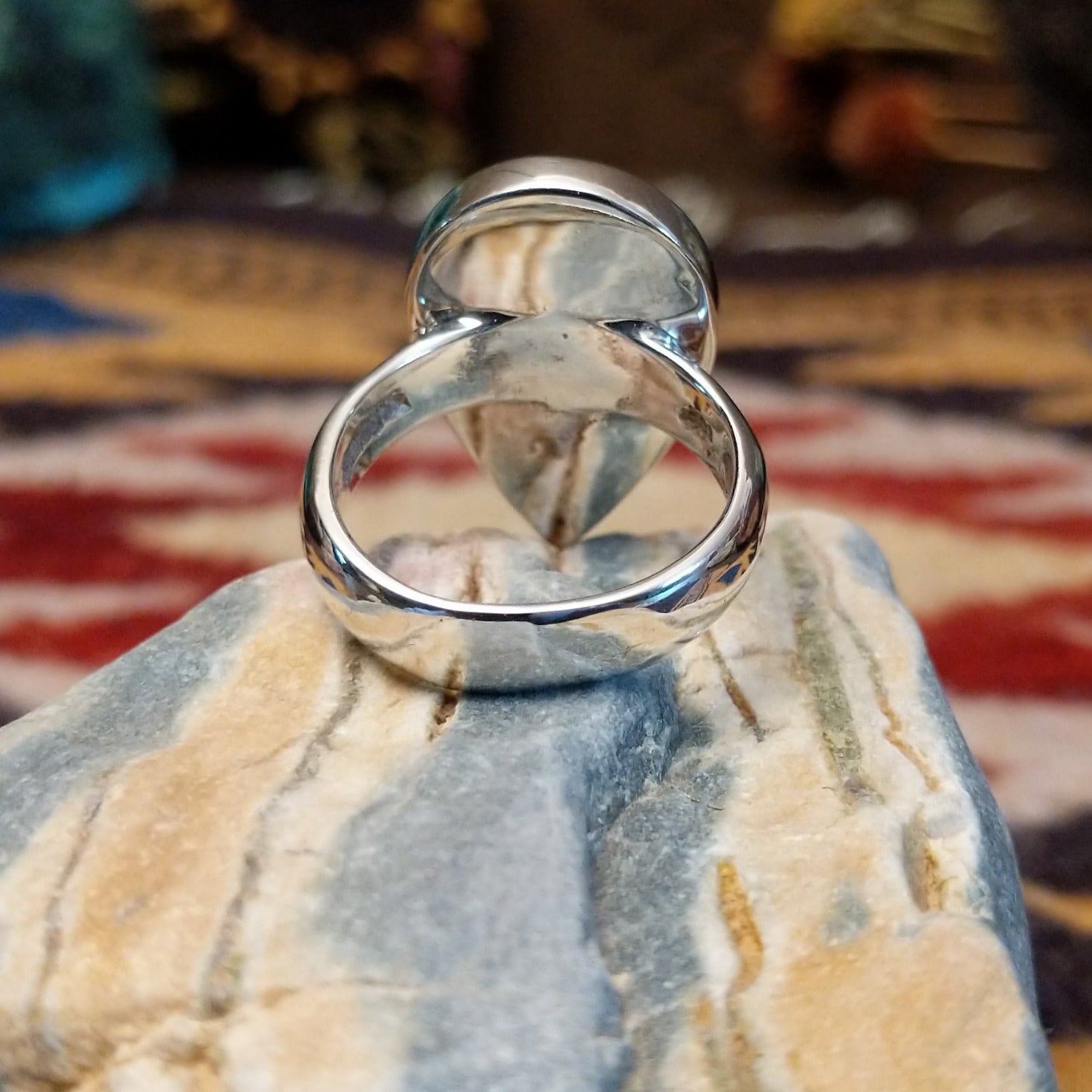 Handcrafted Navajo sterling silver teardrop ring by R.L. featuring colorful multistone inlay work in a traditional Southwestern Native American design. Underside view.