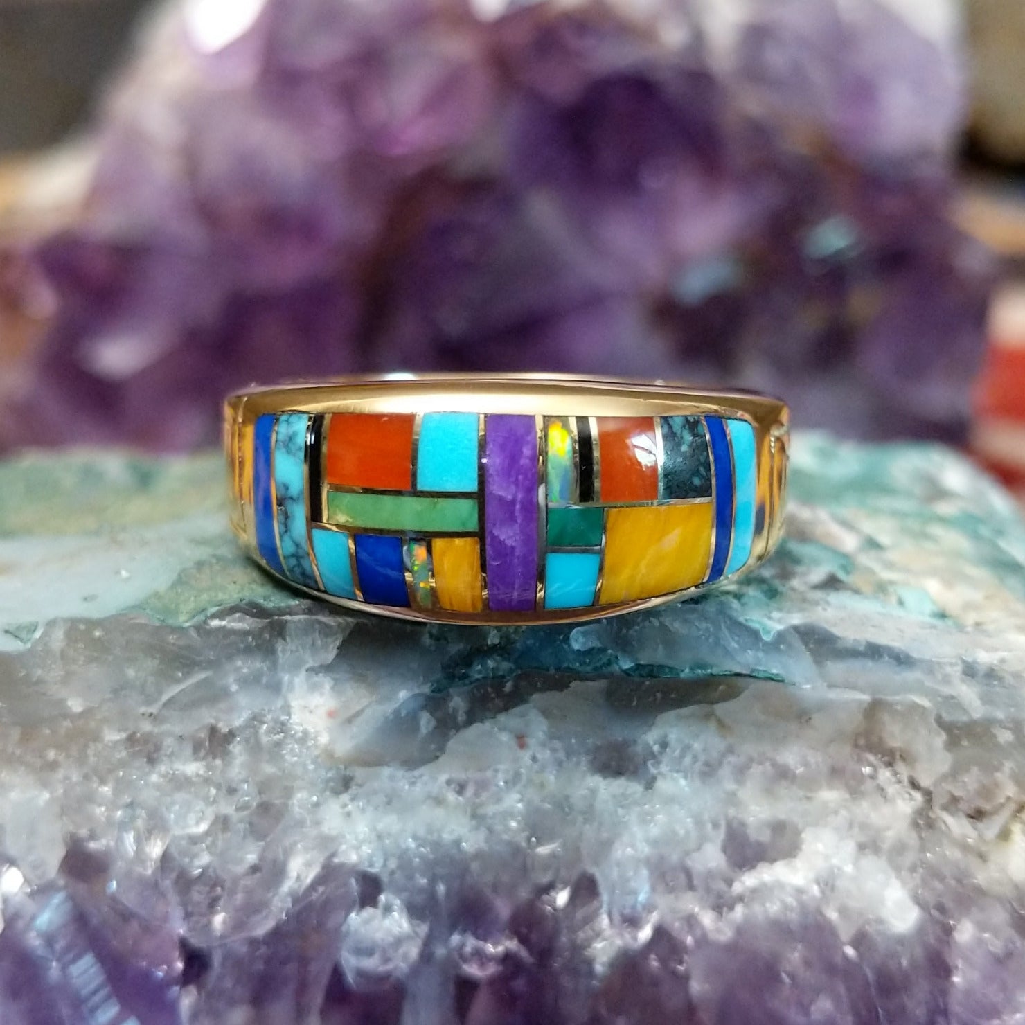 Navajo multistone mosaic inlay ring in 14K yellow gold, featuring a colorful arrangement of individually fitted stones set within a polished gold band.
