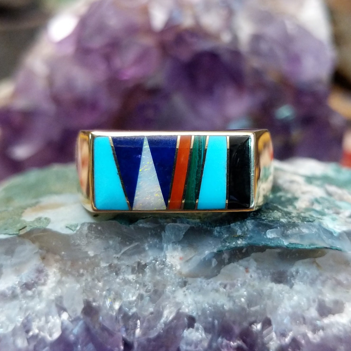 Multistone inlay ring in 14K yellow gold by Steve Francisco, featuring a vibrant mosaic of carefully fitted natural stones set within a polished gold band.