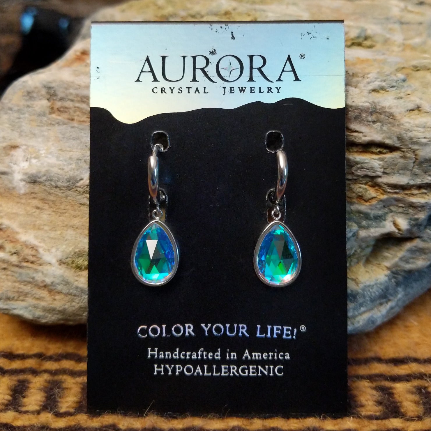 Aurora teardrop crystal earrings by LeightWorks, featuring faceted teardrop-shaped crystals with brilliant sparkle and an elegant lightweight design.