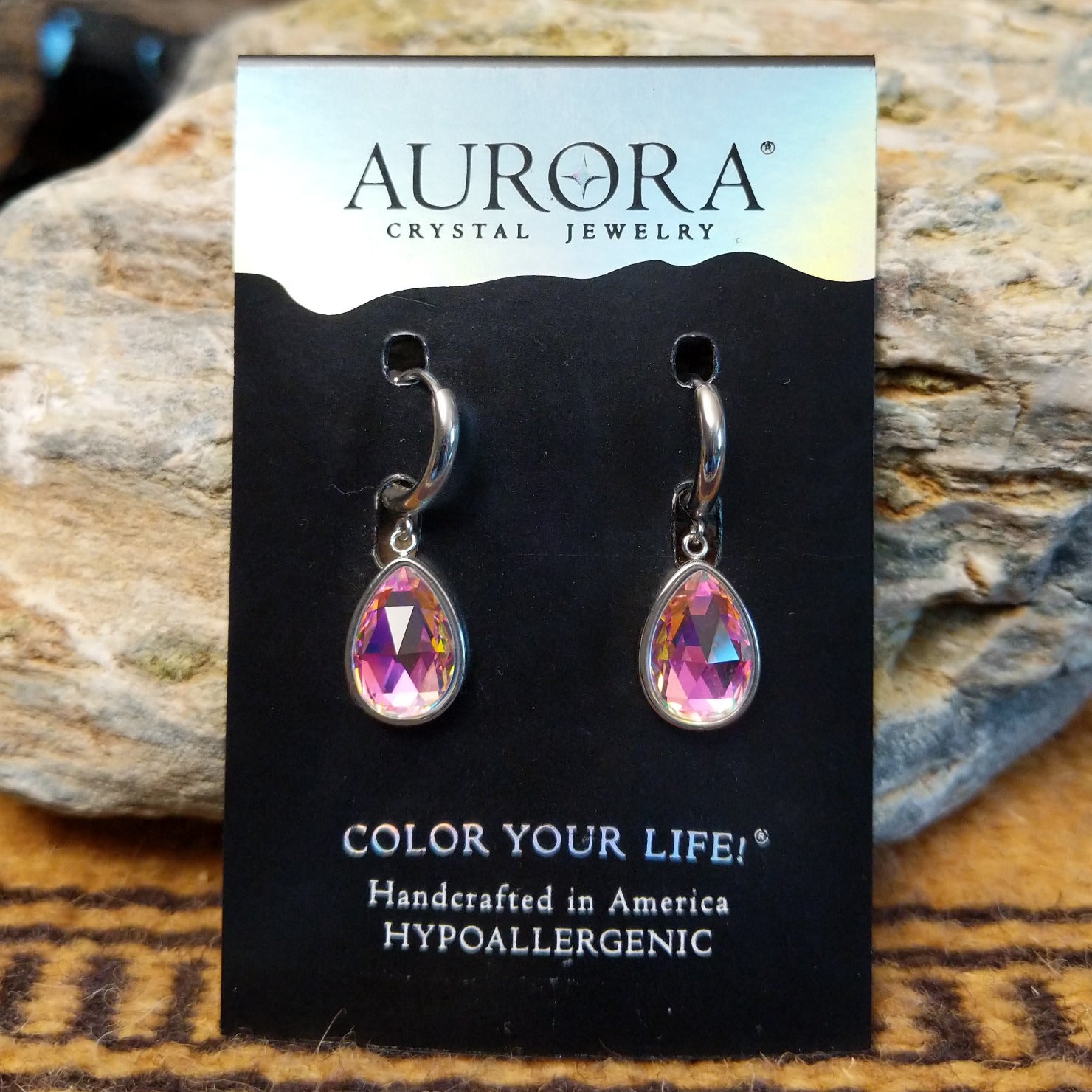 Aurora teardrop crystal earrings by LeightWorks, featuring faceted teardrop-shaped crystals with brilliant sparkle and an elegant lightweight design.