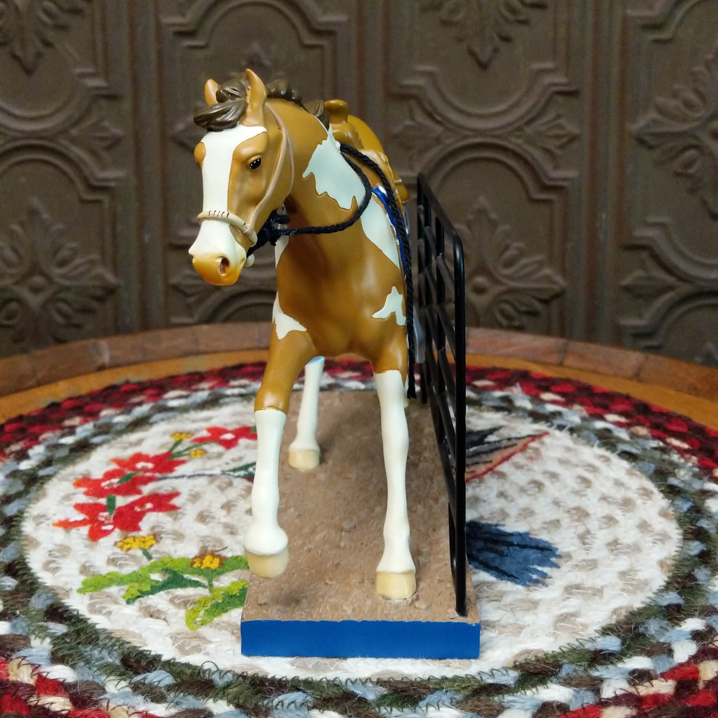 "The Foreman" collectible pony by The Trail of Painted Ponies, featuring detailed hand-painted Western-inspired artwork and ranching-themed design elements. Front view.