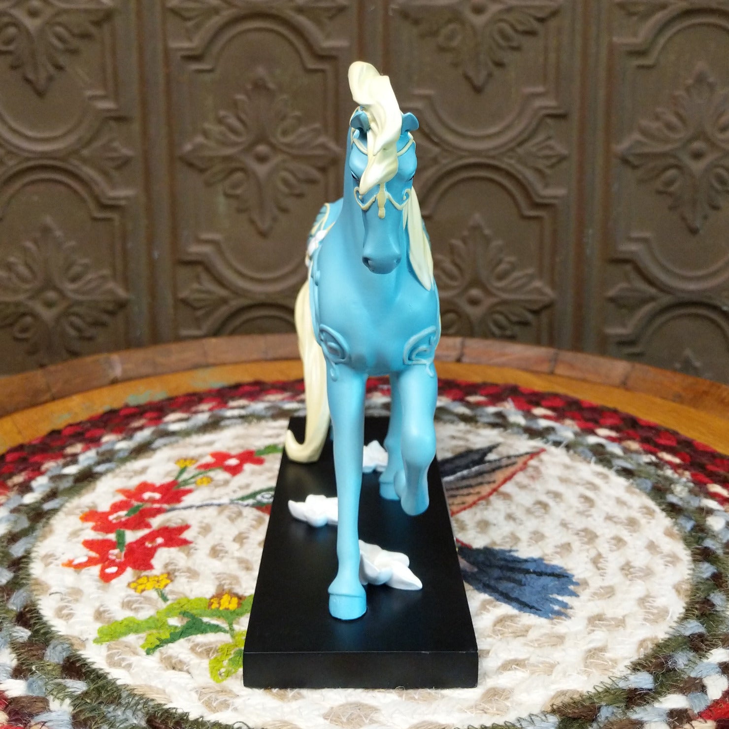 "Summer Moon" collectible pony by The Trail of Painted Ponies, featuring detailed hand-painted artwork, moon-inspired design elements, and rich vibrant colors. Front view.