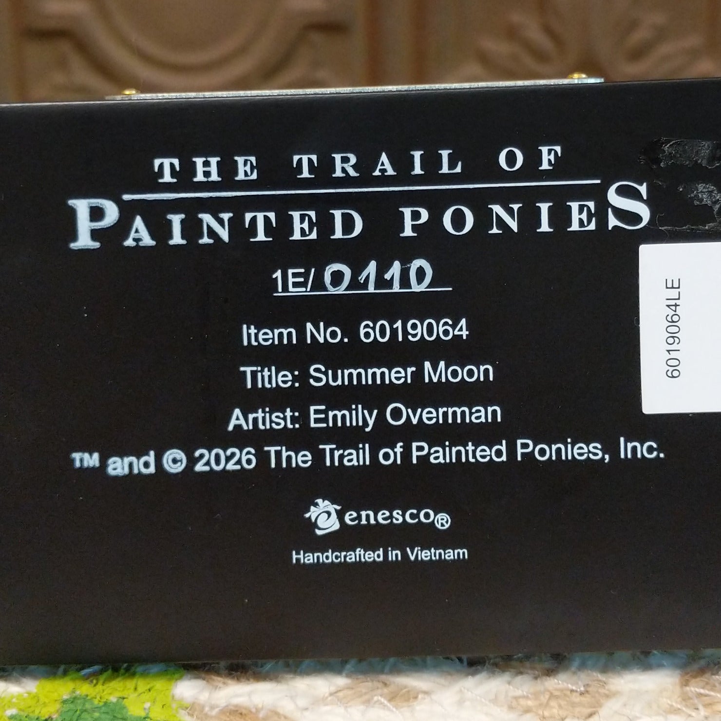 "Summer Moon" collectible pony by The Trail of Painted Ponies, featuring detailed hand-painted artwork, moon-inspired design elements, and rich vibrant colors. Production number.