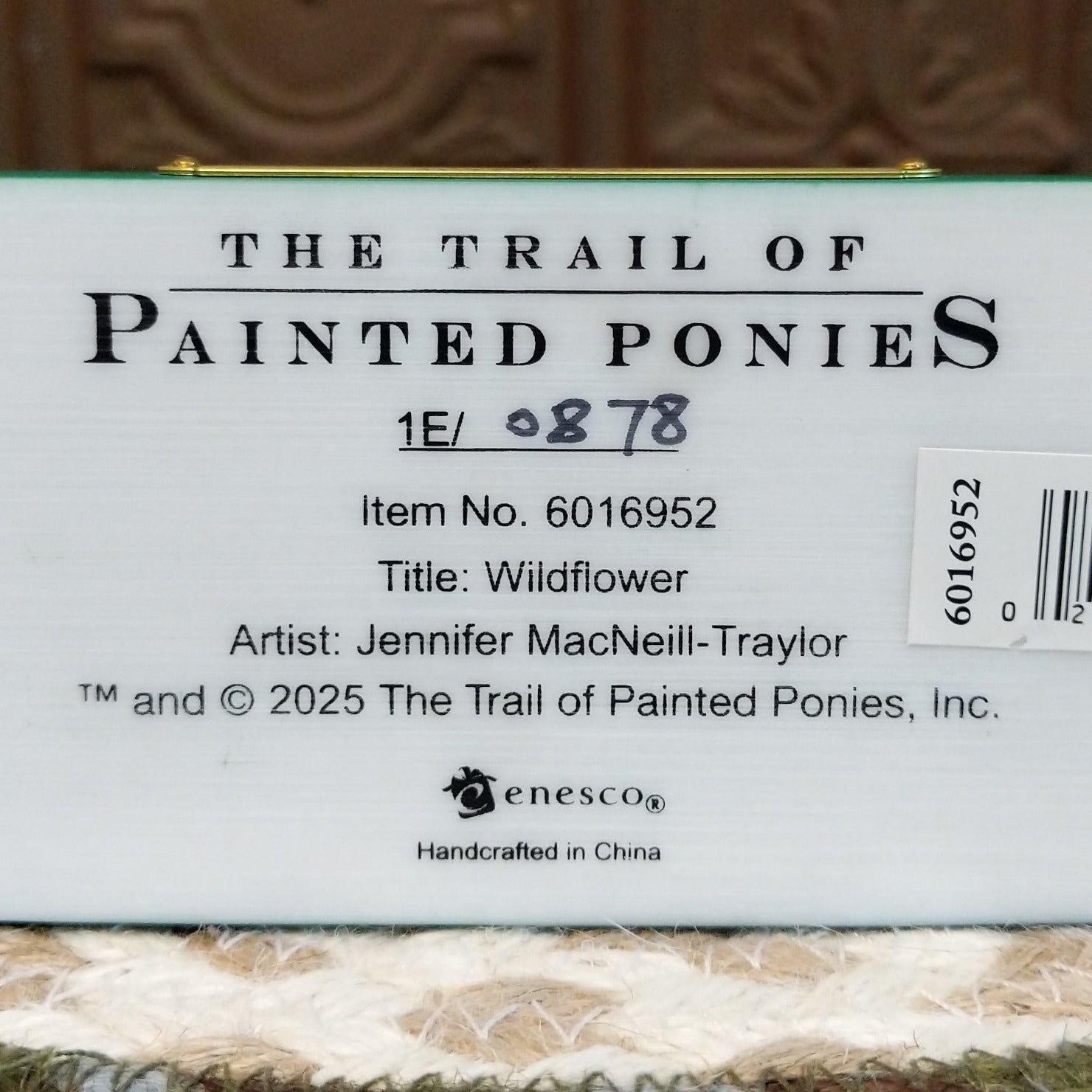 "Wildflower" collectible pony by The Trail of Painted Ponies, featuring detailed hand-painted floral artwork, vibrant colors, and nature-inspired design elements. Production number.