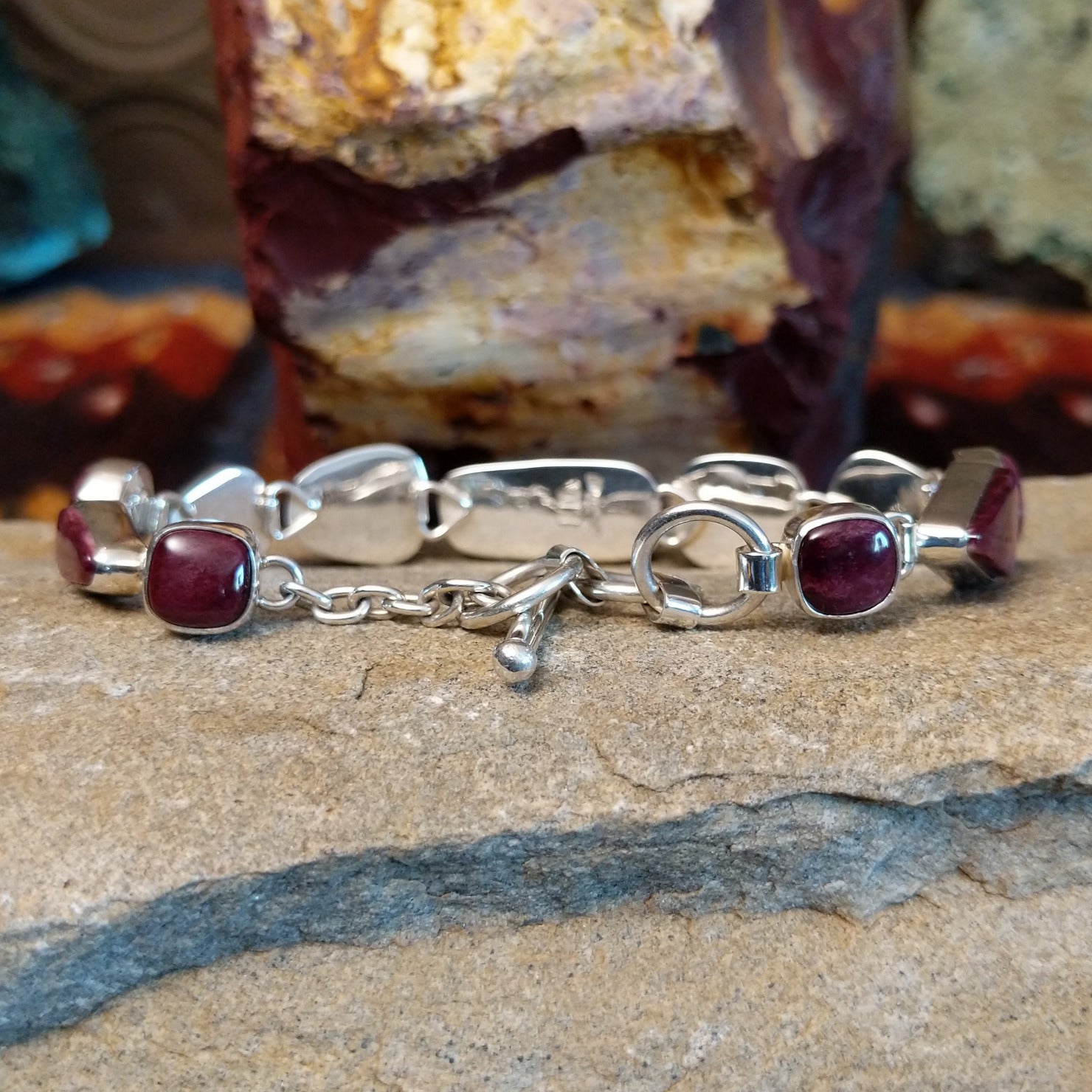 Purple spiny oyster shell link bracelet and adjustable clasp.