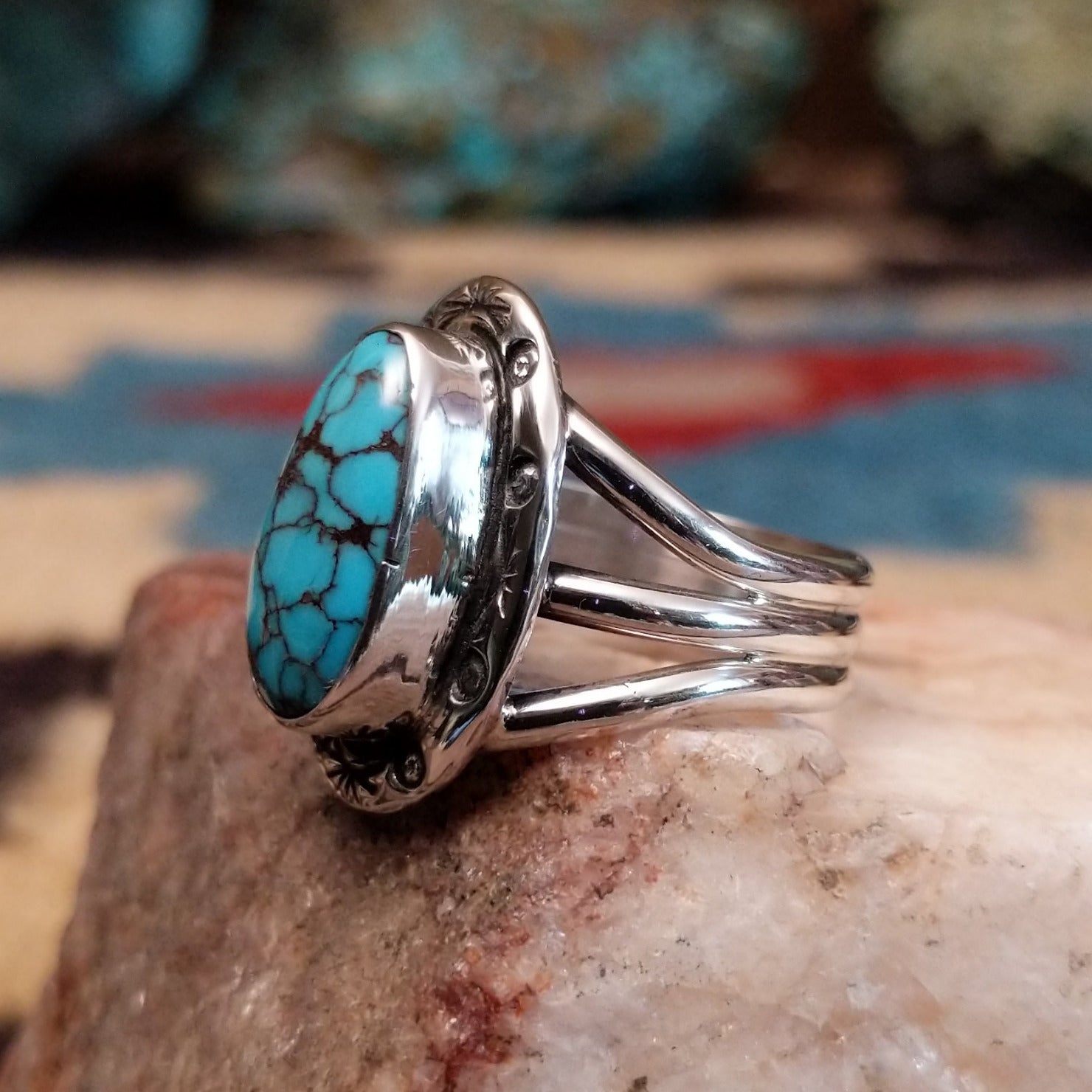 Sterling silver ring with Redskin turquoise set in oval bezel.