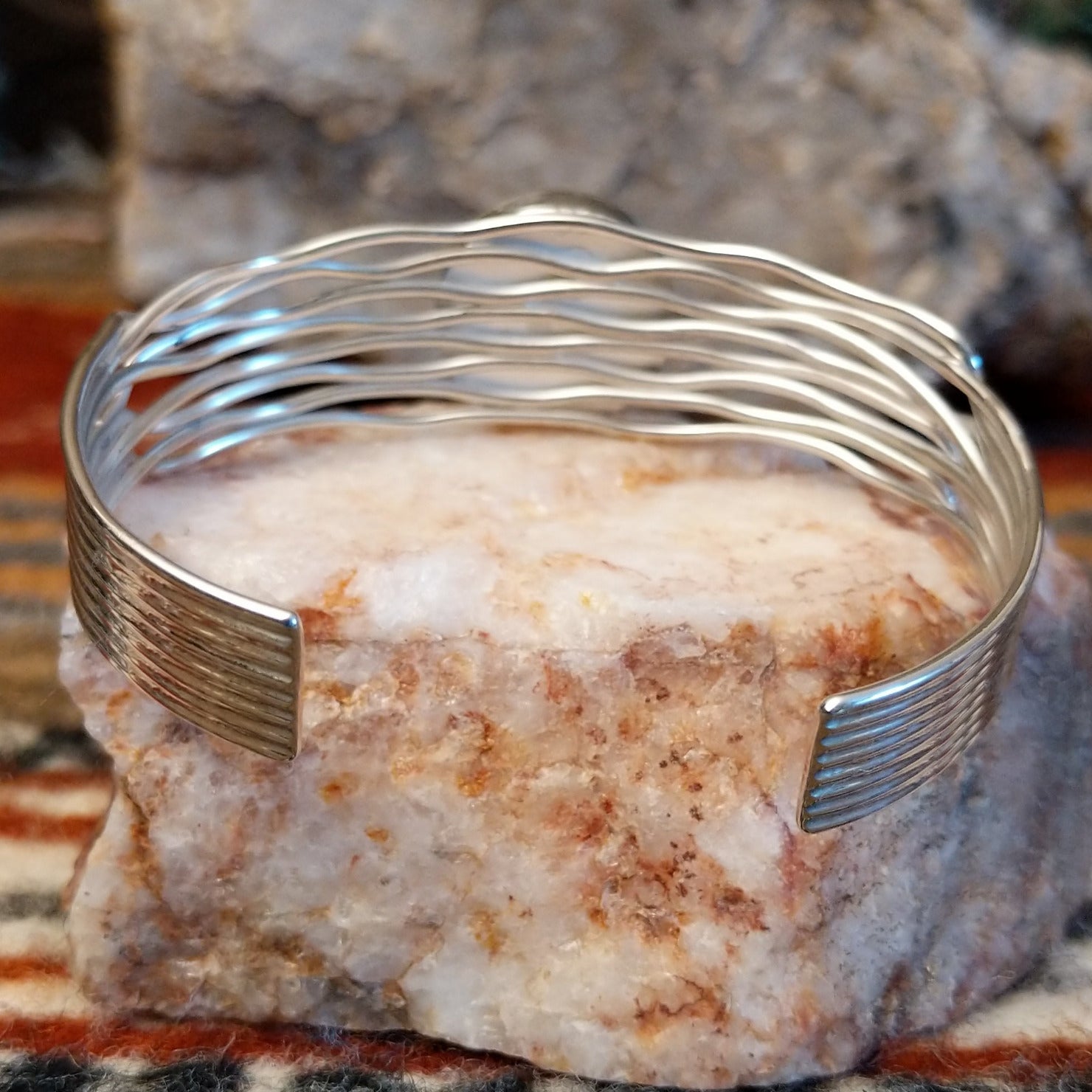 Close-up of the layered wire cuff band.