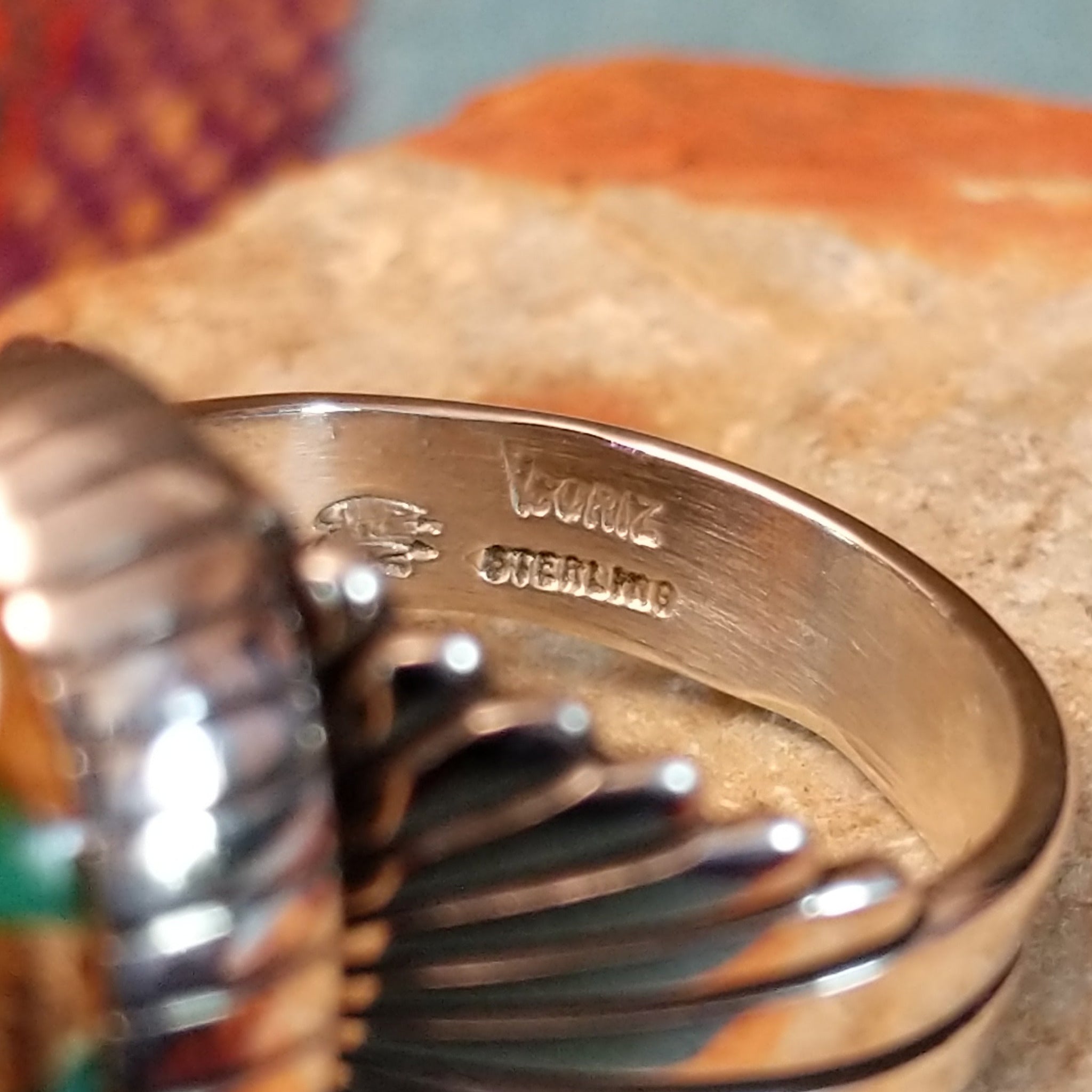Close up of the artist's stamped signature