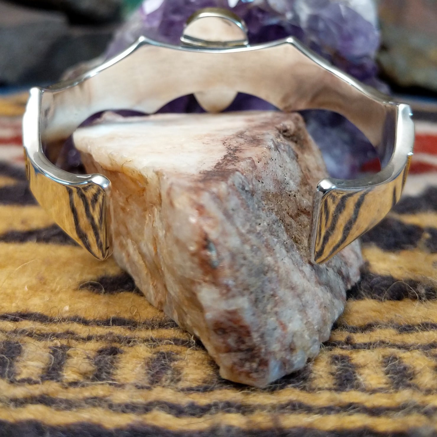 Interior view of handcrafted cuff showing band thickness and fit.