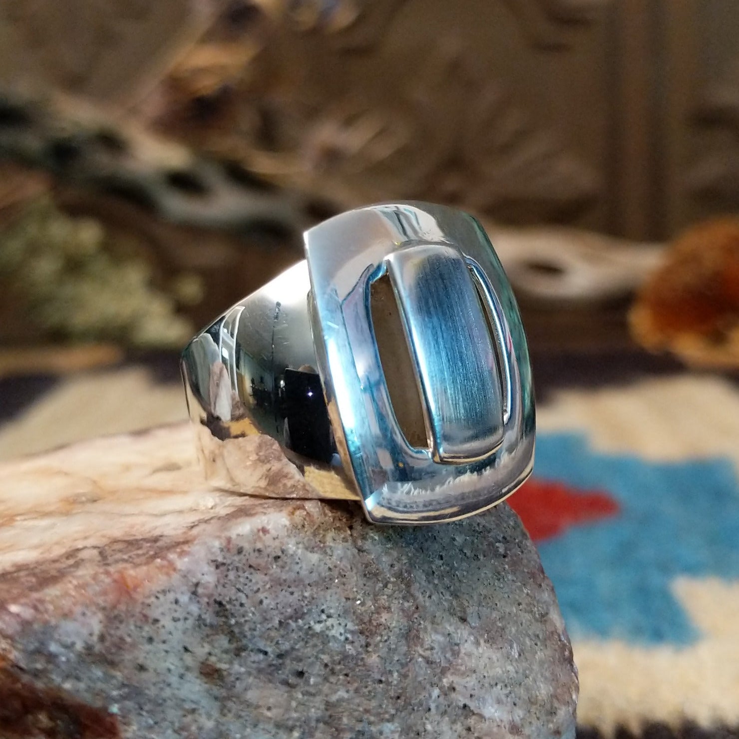 Sterling silver ring with bridge centerpiece.