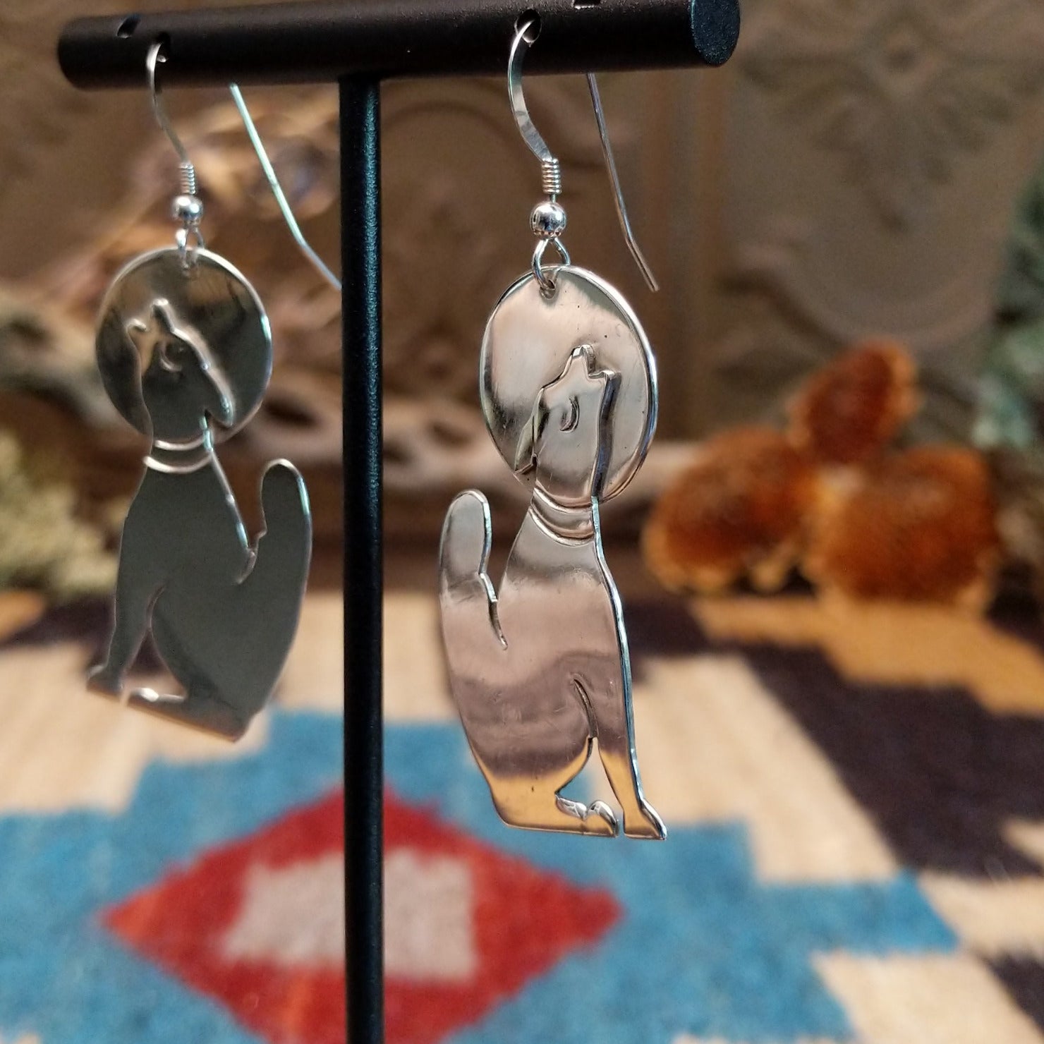 Sterling silver coyote howling at the moon earrings.