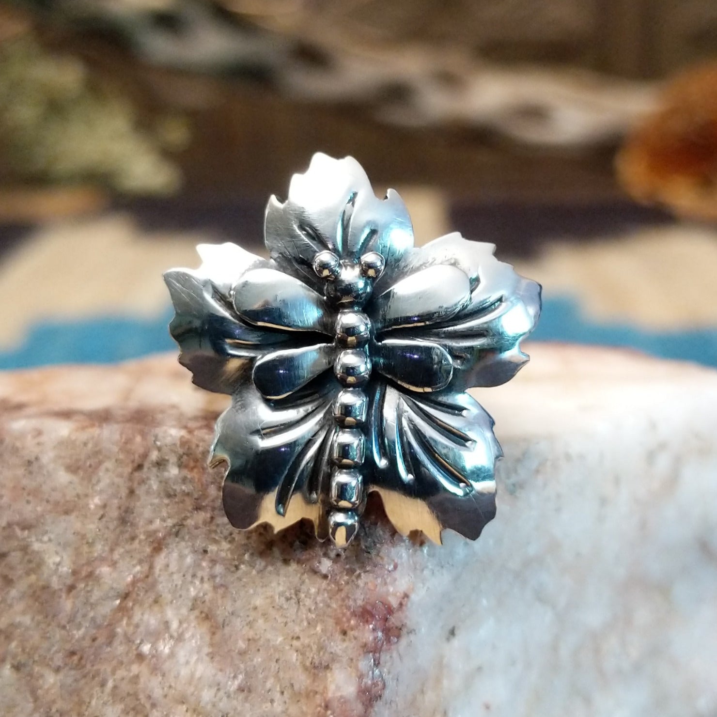 Sterling silver ring with dragonfly motif.