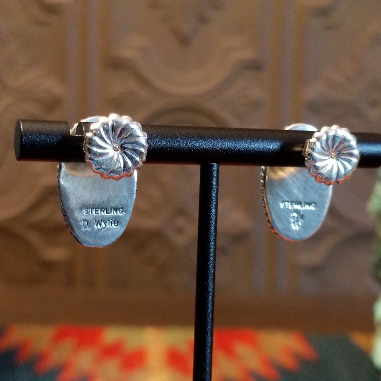 Close-up of the artisan's stamped signature.