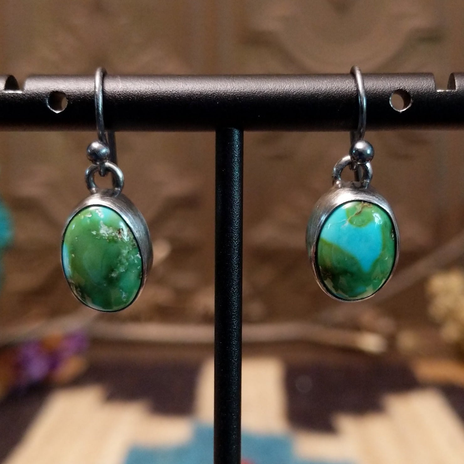 Sterling silver dangle earrings with Sonoran gold turquoise set in ovoid bezels.