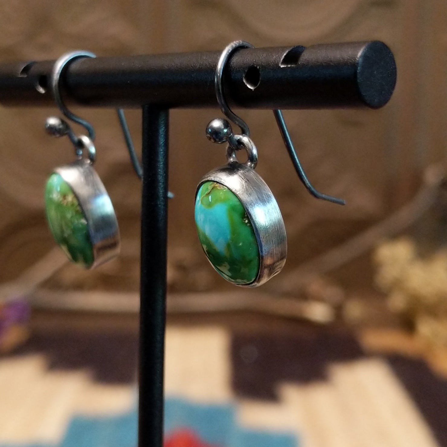 Sterling silver dangle earrings with Sonoran gold turquoise set in ovoid bezels.