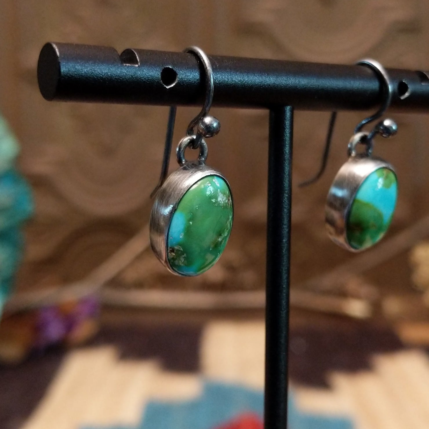 Sterling silver dangle earrings with Sonoran gold turquoise set in ovoid bezels.