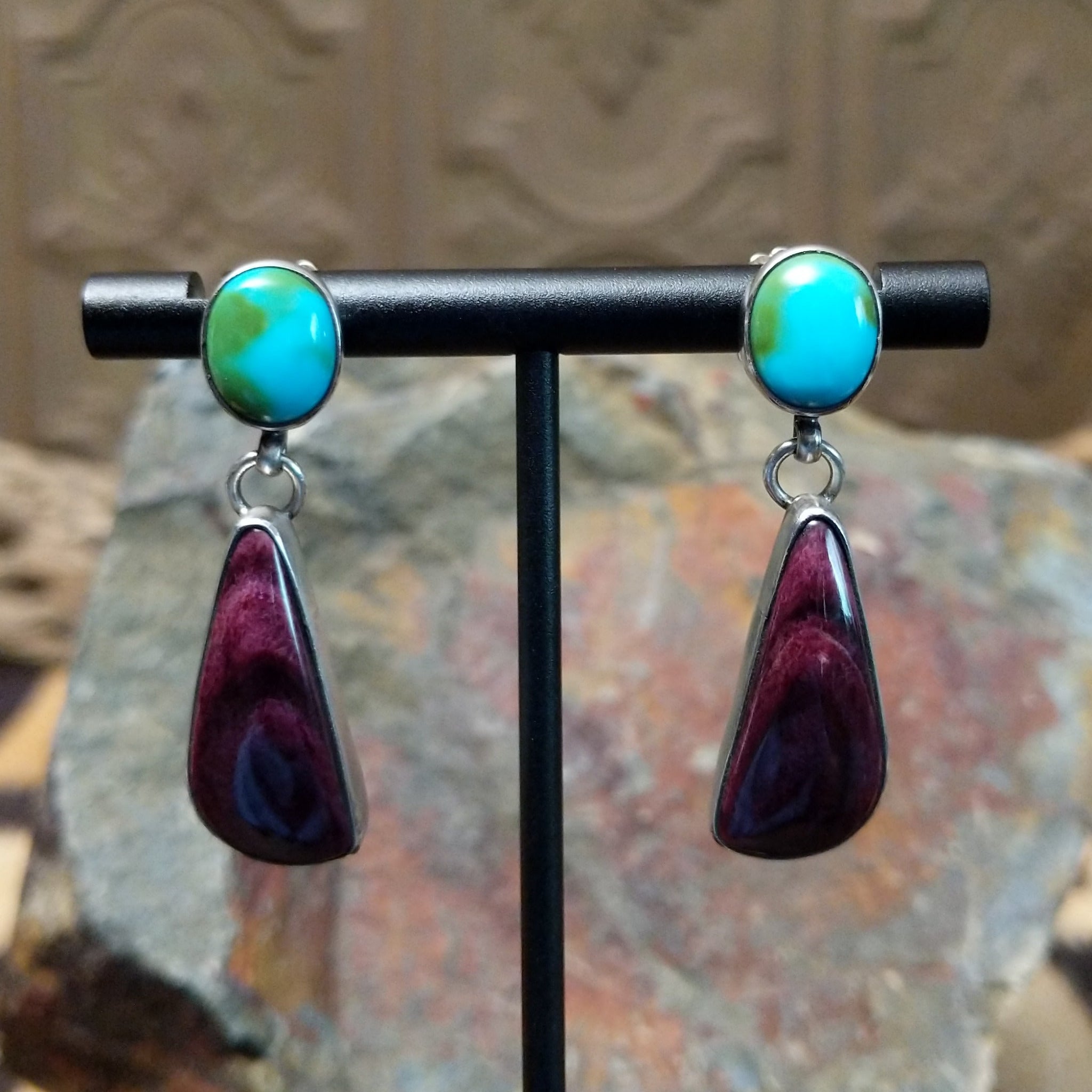 Handcrafted sterling silver Sonoran Gold turquoise and purple spiny oyster earrings by Lucy Jake, featuring a two-stone dangle design.