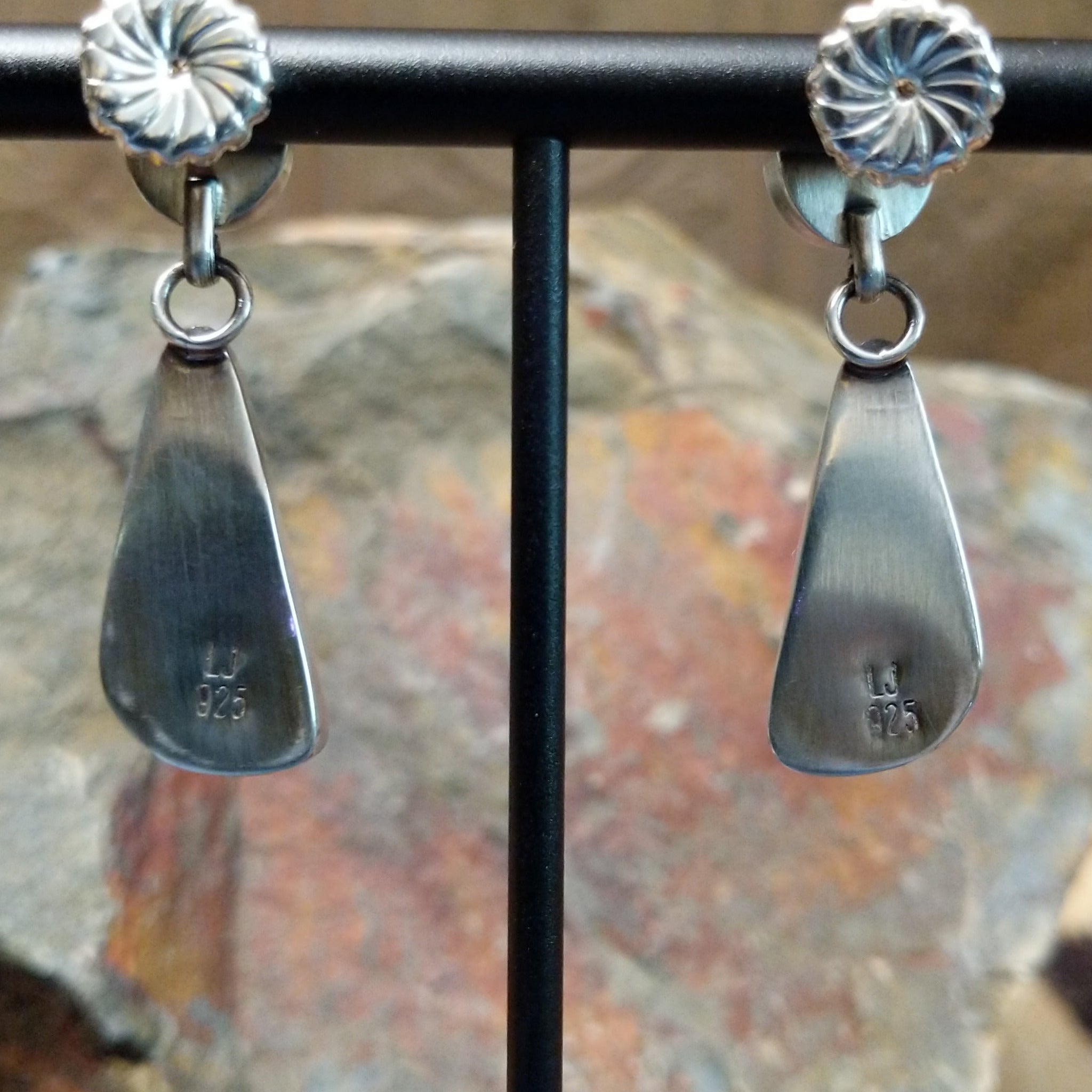 Handcrafted sterling silver Sonoran Gold turquoise and purple spiny oyster earrings by Lucy Jake, featuring a two-stone dangle design; artisan and Sterling Silver stamp.