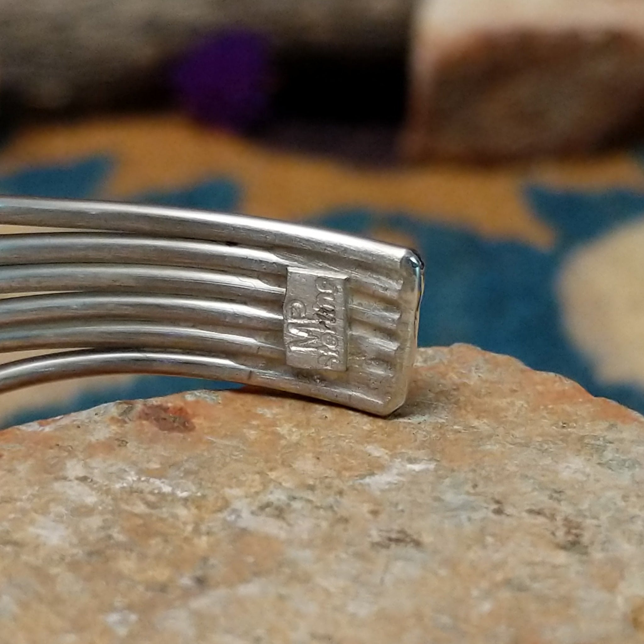 Handcrafted Navajo sterling silver five-strand cuff by Murphy Platero featuring an oval Sonoran Gold turquoise cabochon in a flowing open-wire design; artisan and Sterling Silver stamp.