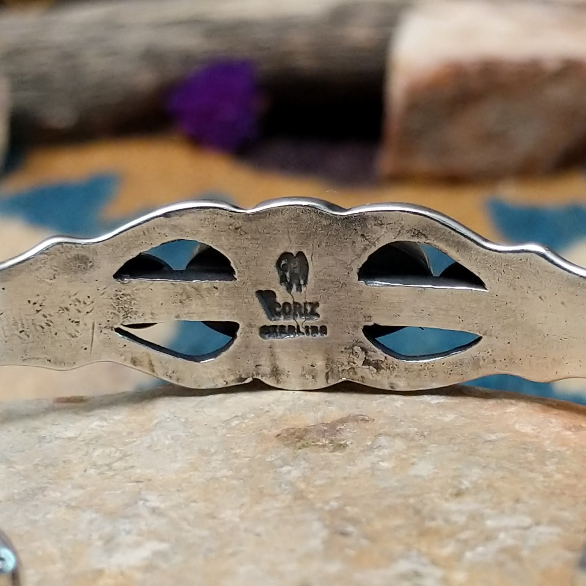 Handcrafted Navajo sterling silver cuff by Raymond Coriz featuring an oval Sonoran Mountain turquoise cabochon with polished silver bead accents, openwork scroll detailing, and a triple-split cuff design; artisan and Sterling Silver stamp.