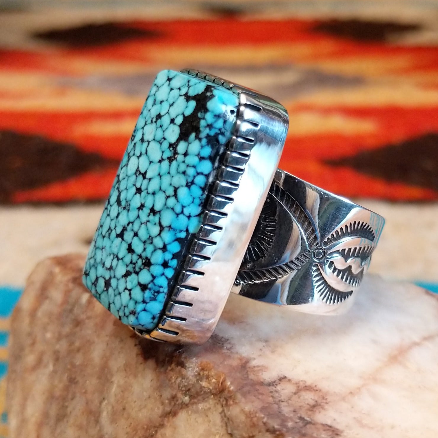 Sterling silver ring with Spiderweb Kingman turquoise set in a rectangular bezel.