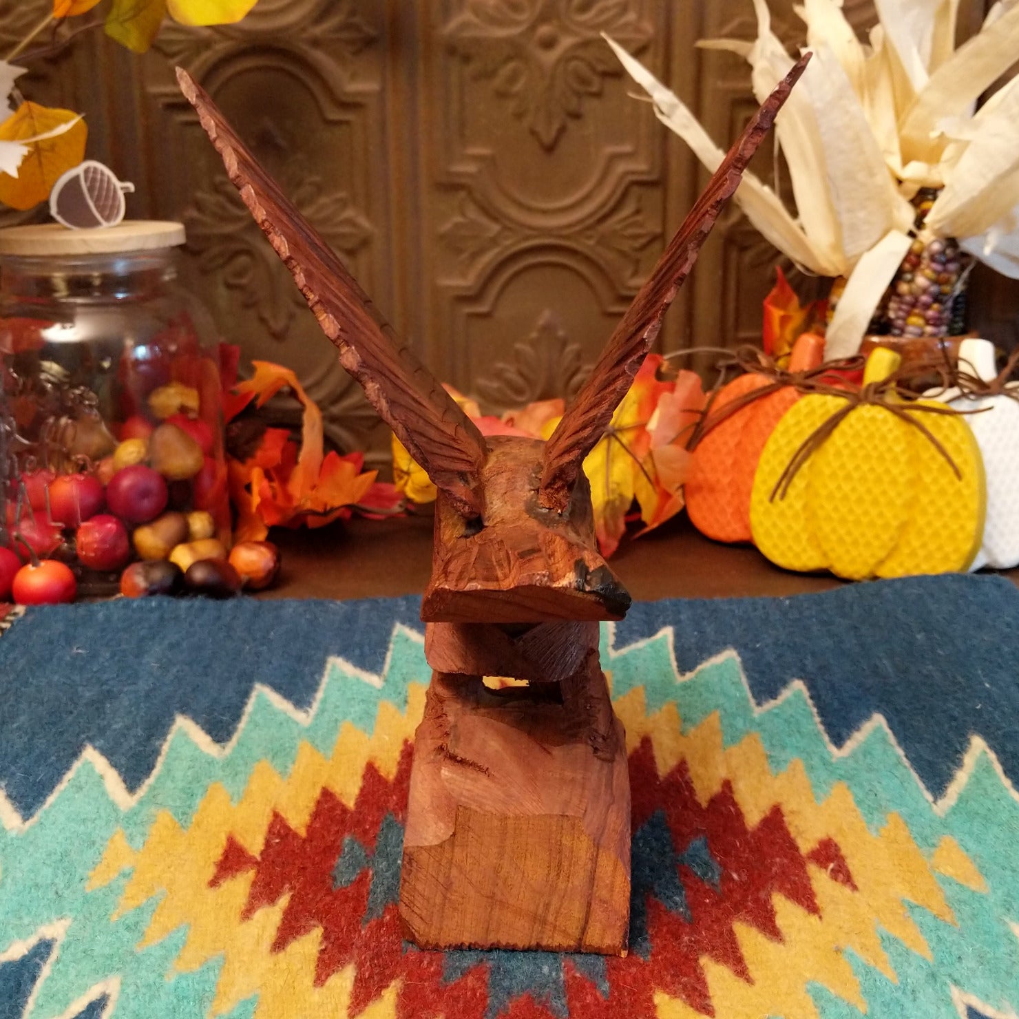 Ironwood carved into a detailed eagle taking flight.