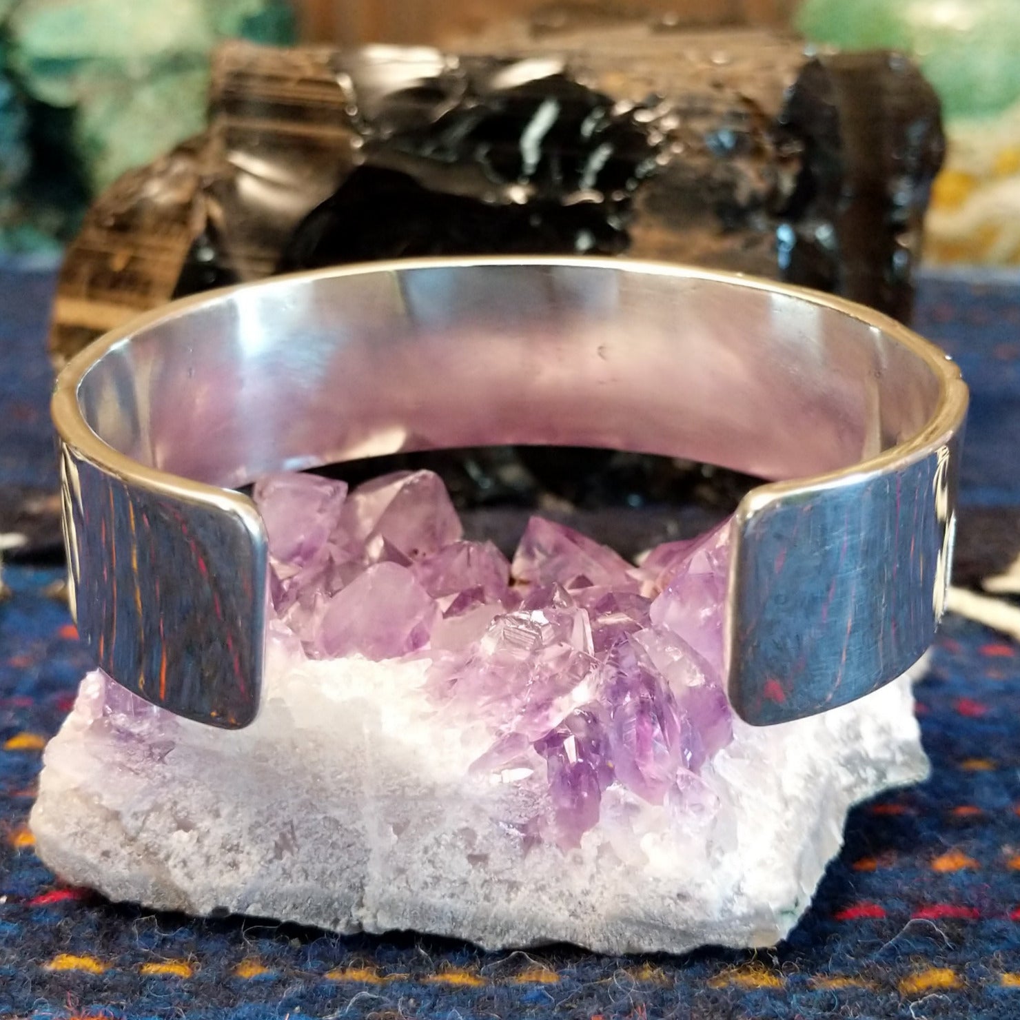 The back showcases the polished finish of the cuff.