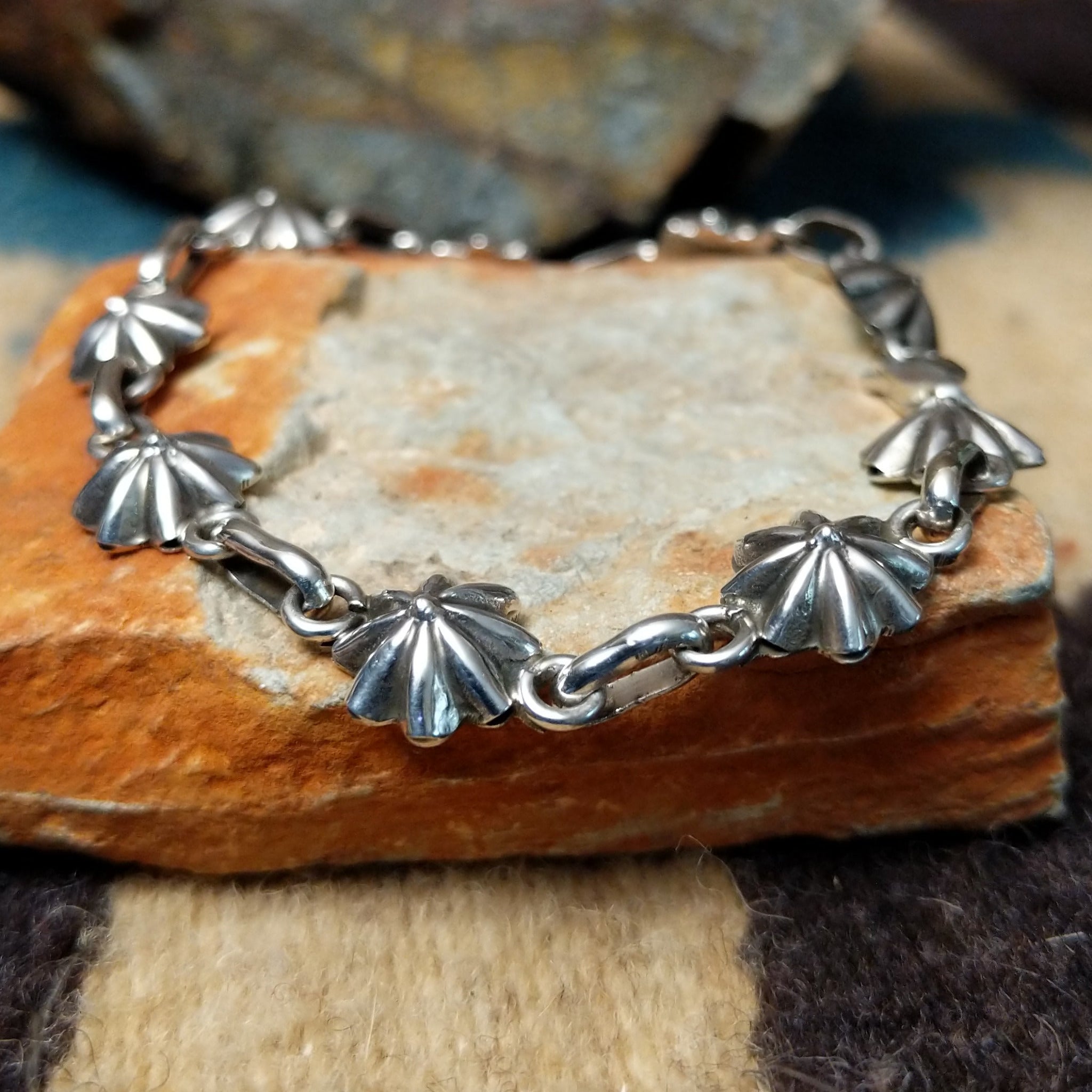 Sterling silver star link bracelet by Nabiho with handcrafted Southwestern star-shaped links.