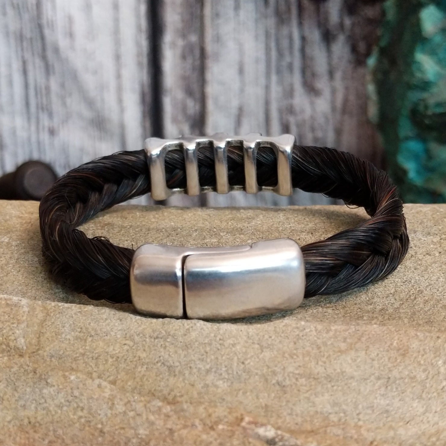 Close-up of the magnetic clasp on the bracelet.