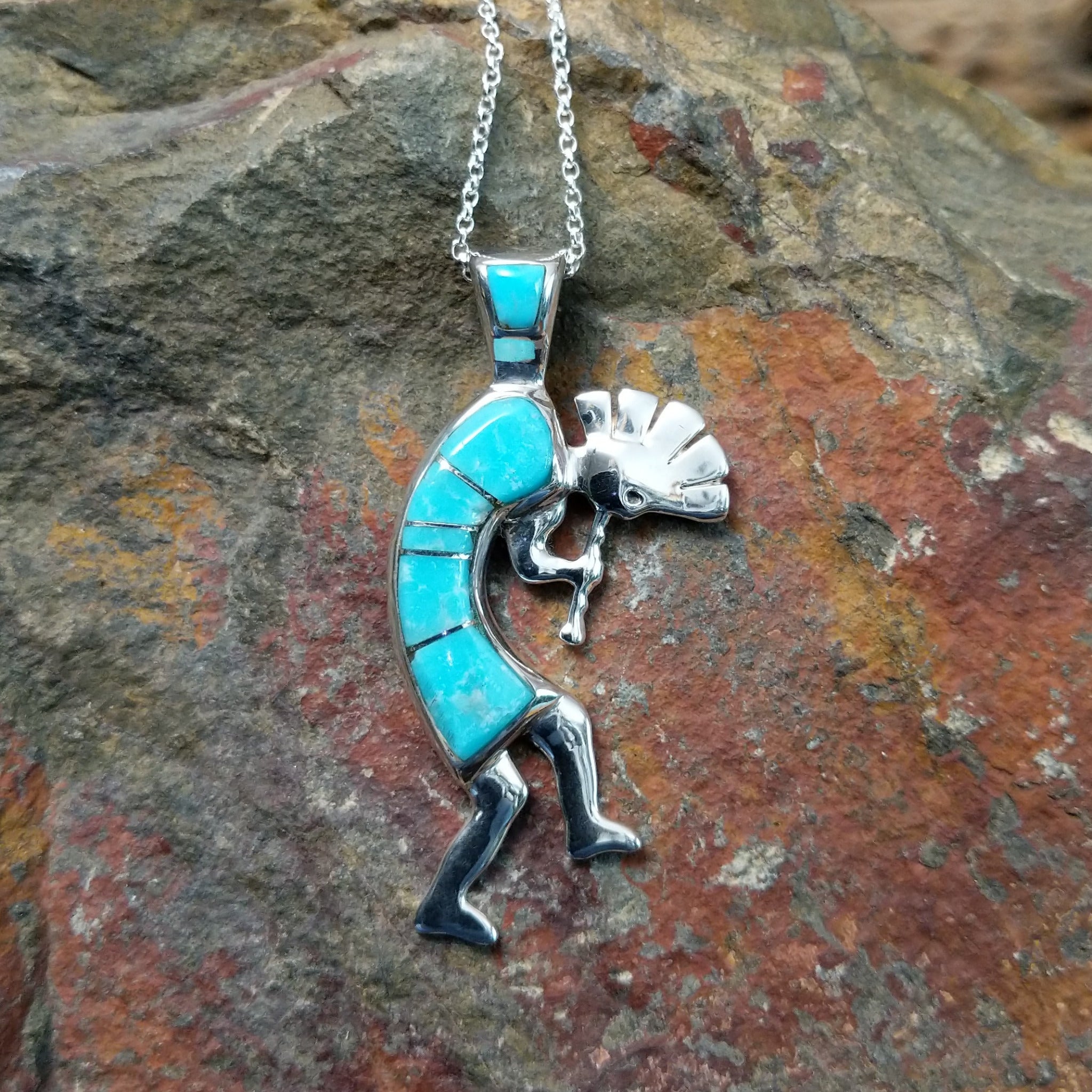 Handcrafted sterling silver turquoise Kokopelli pendant by Bernadine Joe, featuring a traditional Navajo Kokopelli design.