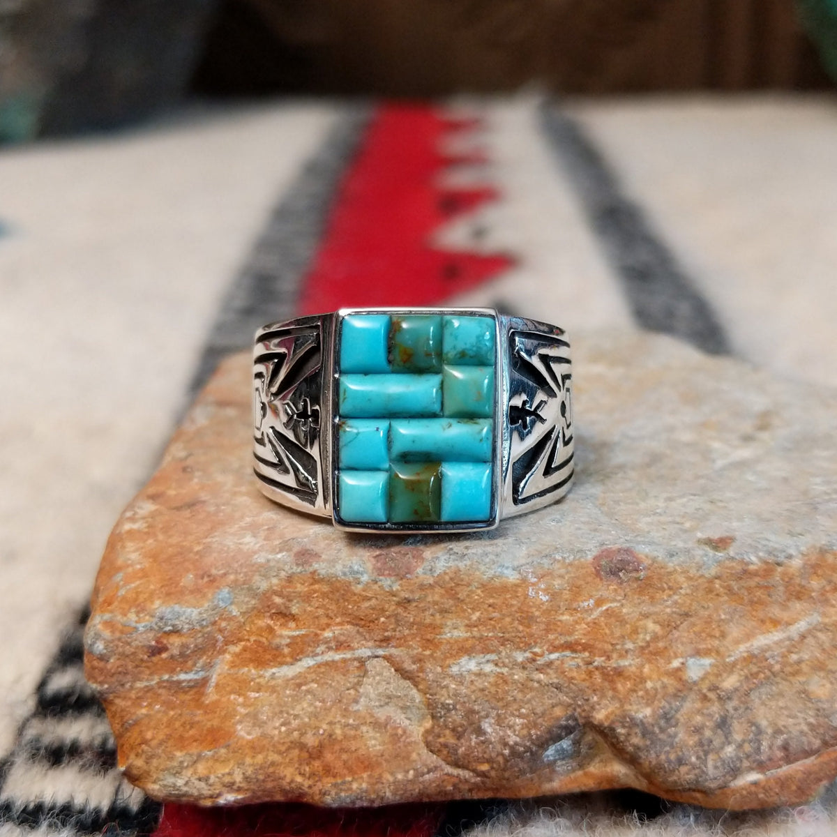 Turquoise inlay ring by Donald Douglas with Man in the Maze design.