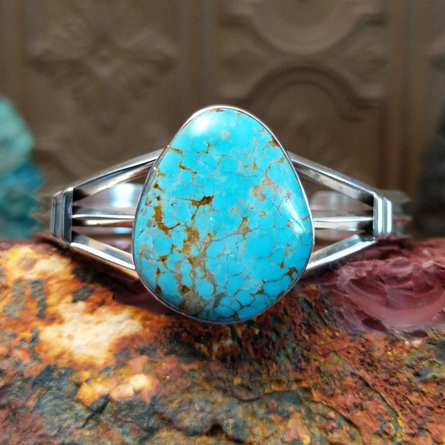 Sterling silver cuff features Turquoise Mountain turquoise set in a large bezel.
