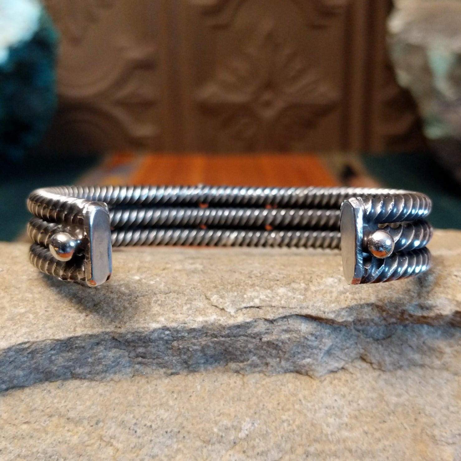 The back of the layered coil cuff design in sterling silver.