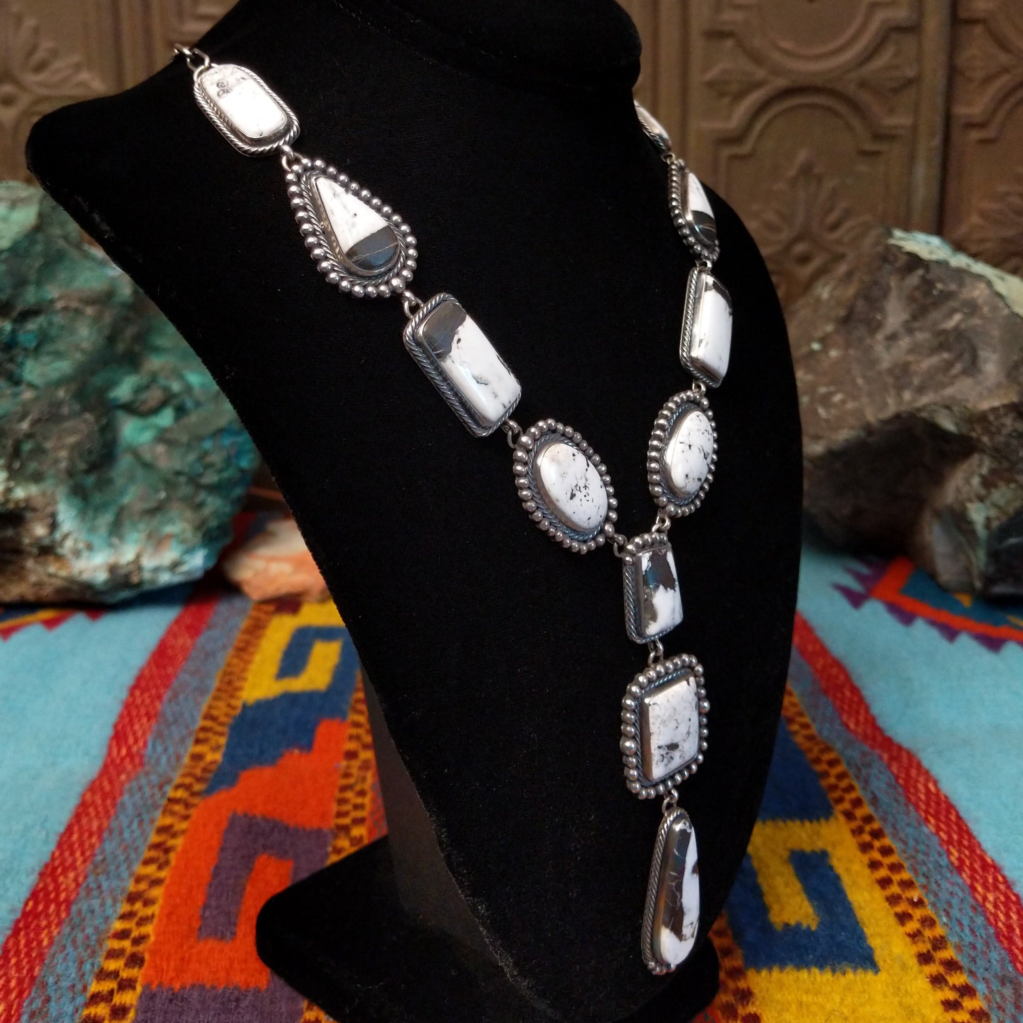 Southwestern-style Sterling Silver necklace and natural black and gray matrix; side view.