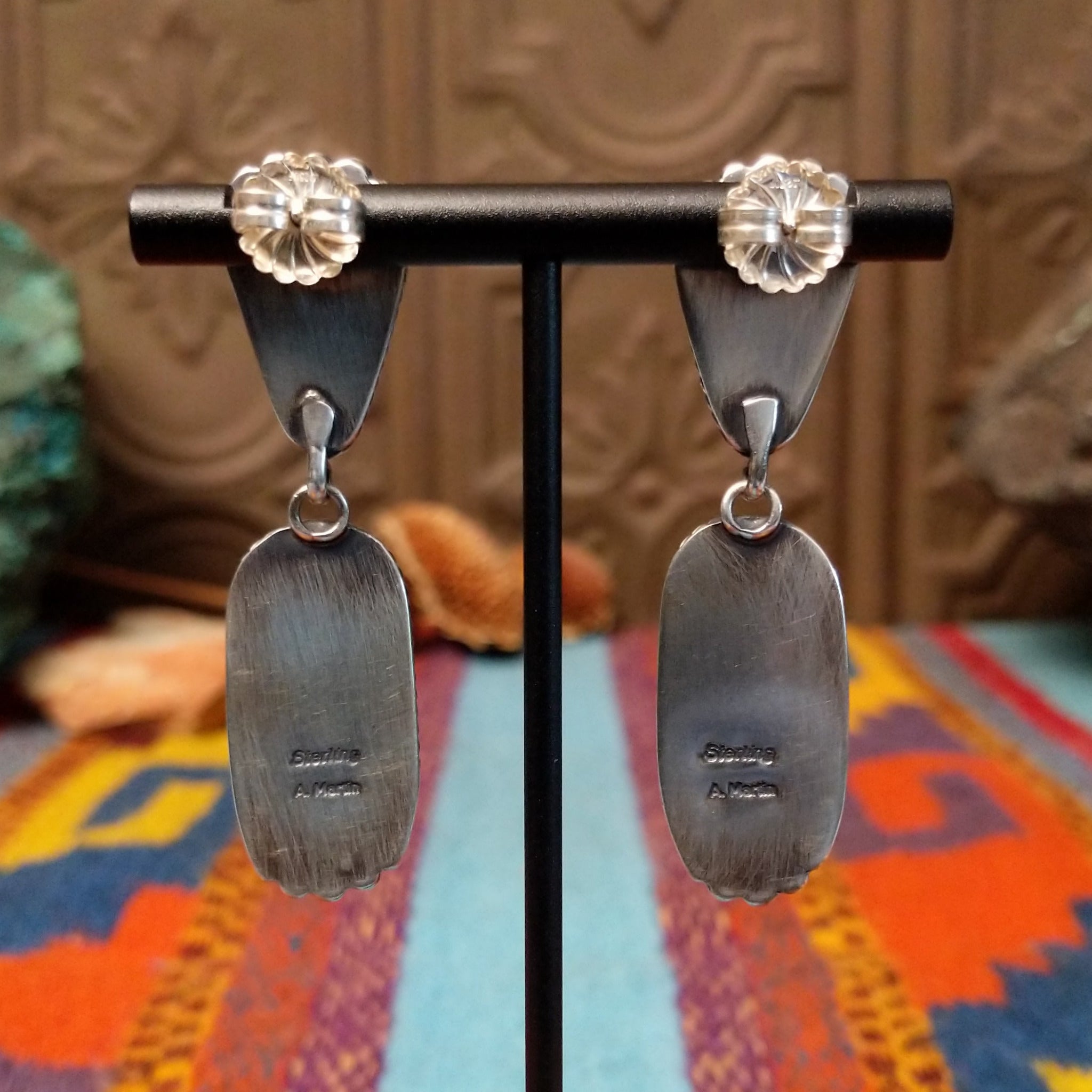 Artisan and Sterling Silver stamp.