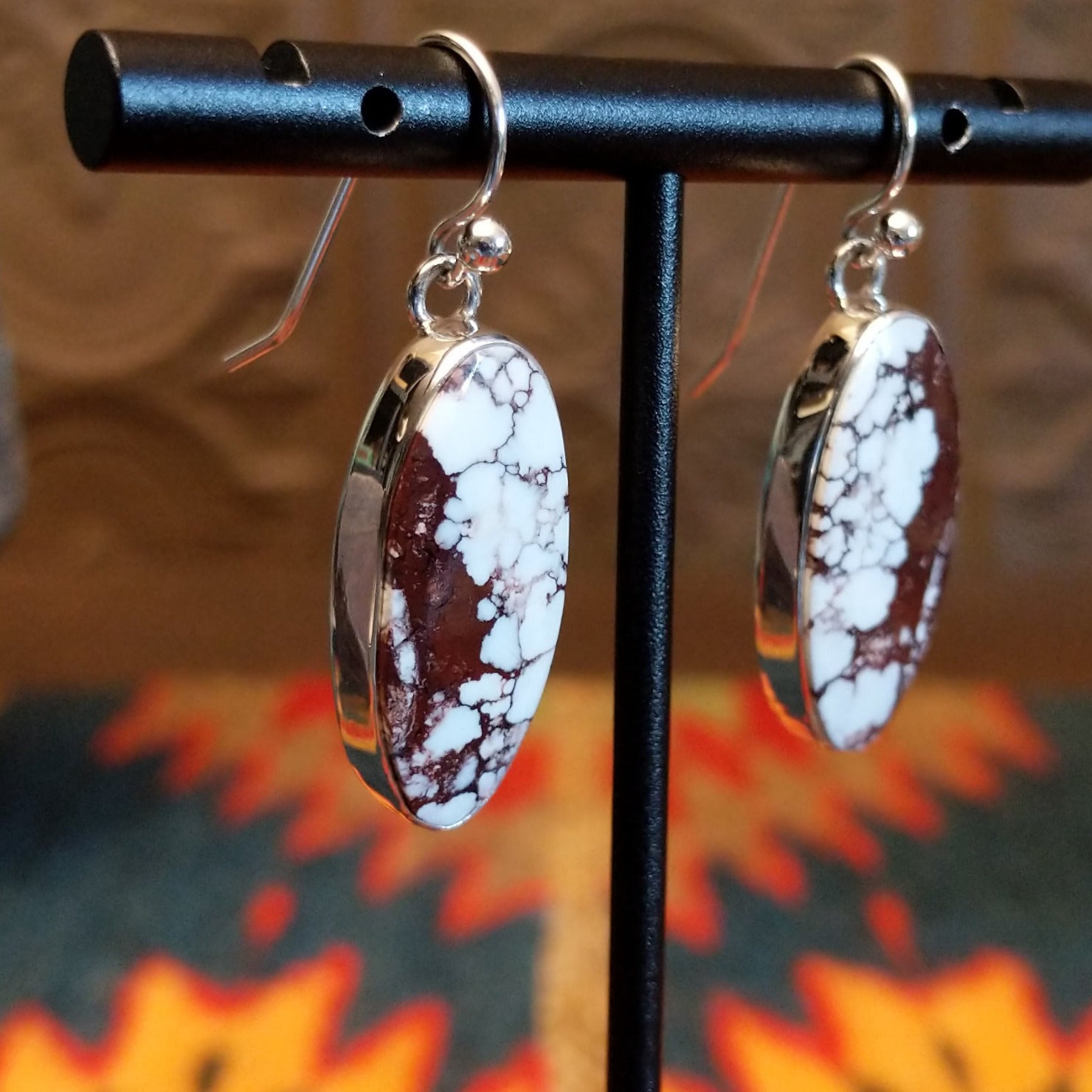 Sterling silver earrings with wild horse stones set in the eclipse bezels.