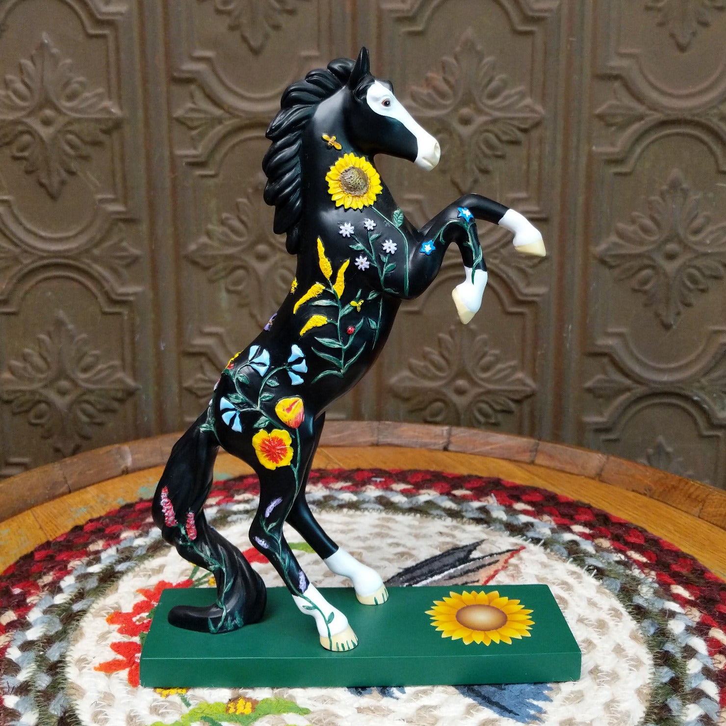 "Wildflower" collectible pony by The Trail of Painted Ponies, featuring detailed hand-painted floral artwork, vibrant colors, and nature-inspired design elements.